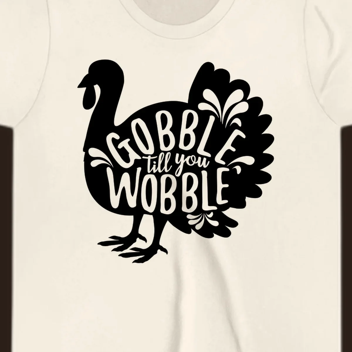 Gobble wobble turkey design with text for Thanksgiving.
