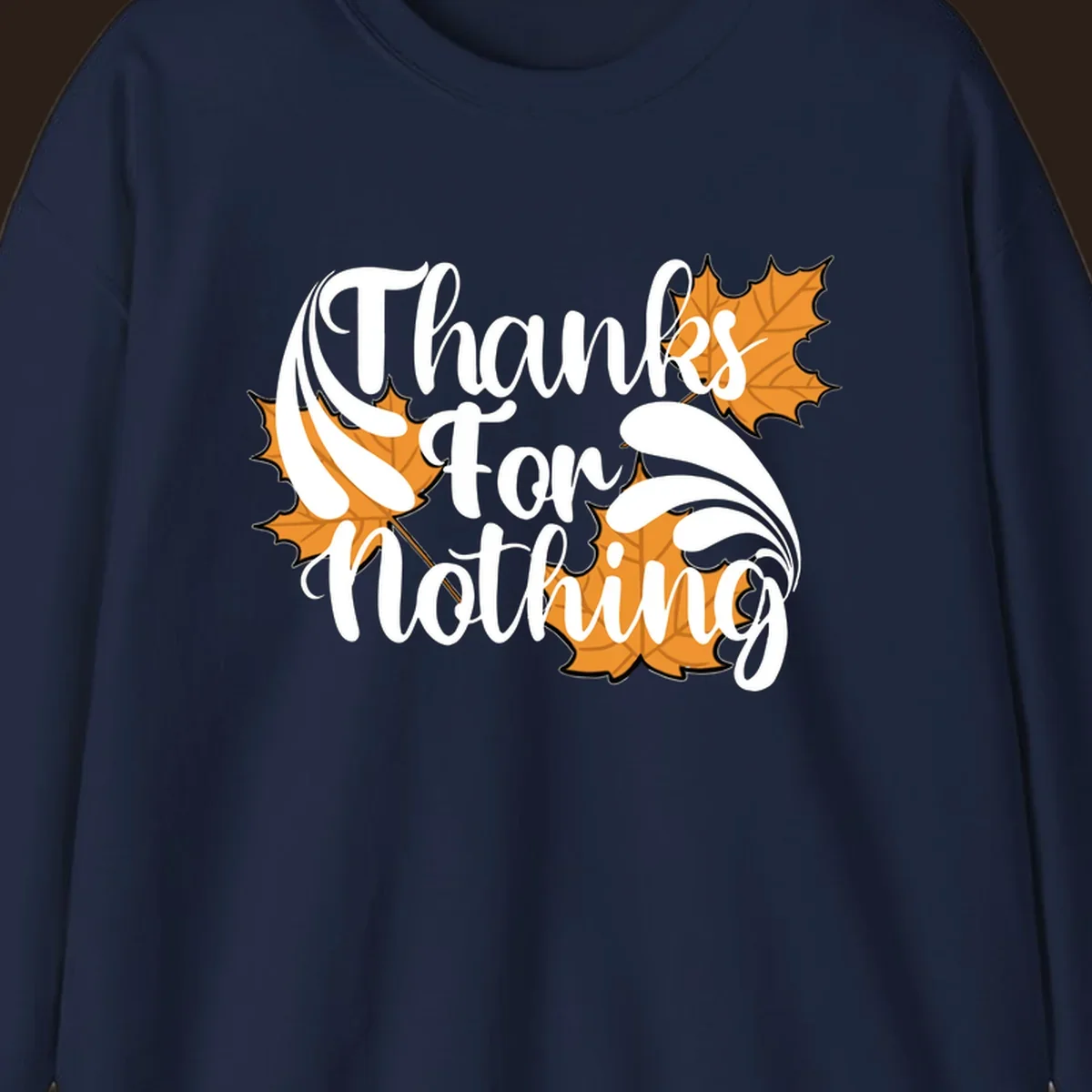 Thanks For Nothing text with orange maple leaves, Thanksgiving design.