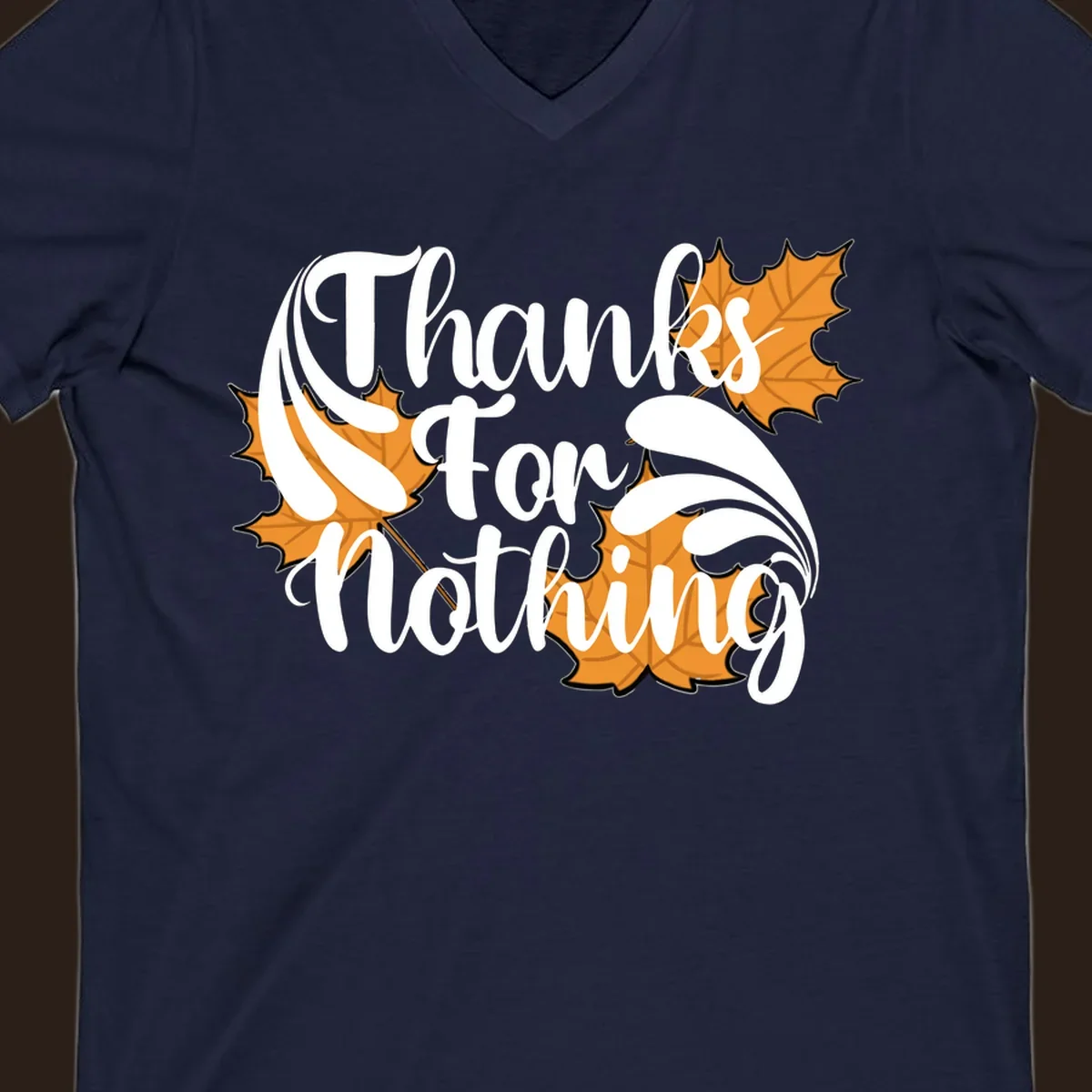 Thanks For Nothing text with orange maple leaves, Thanksgiving design.