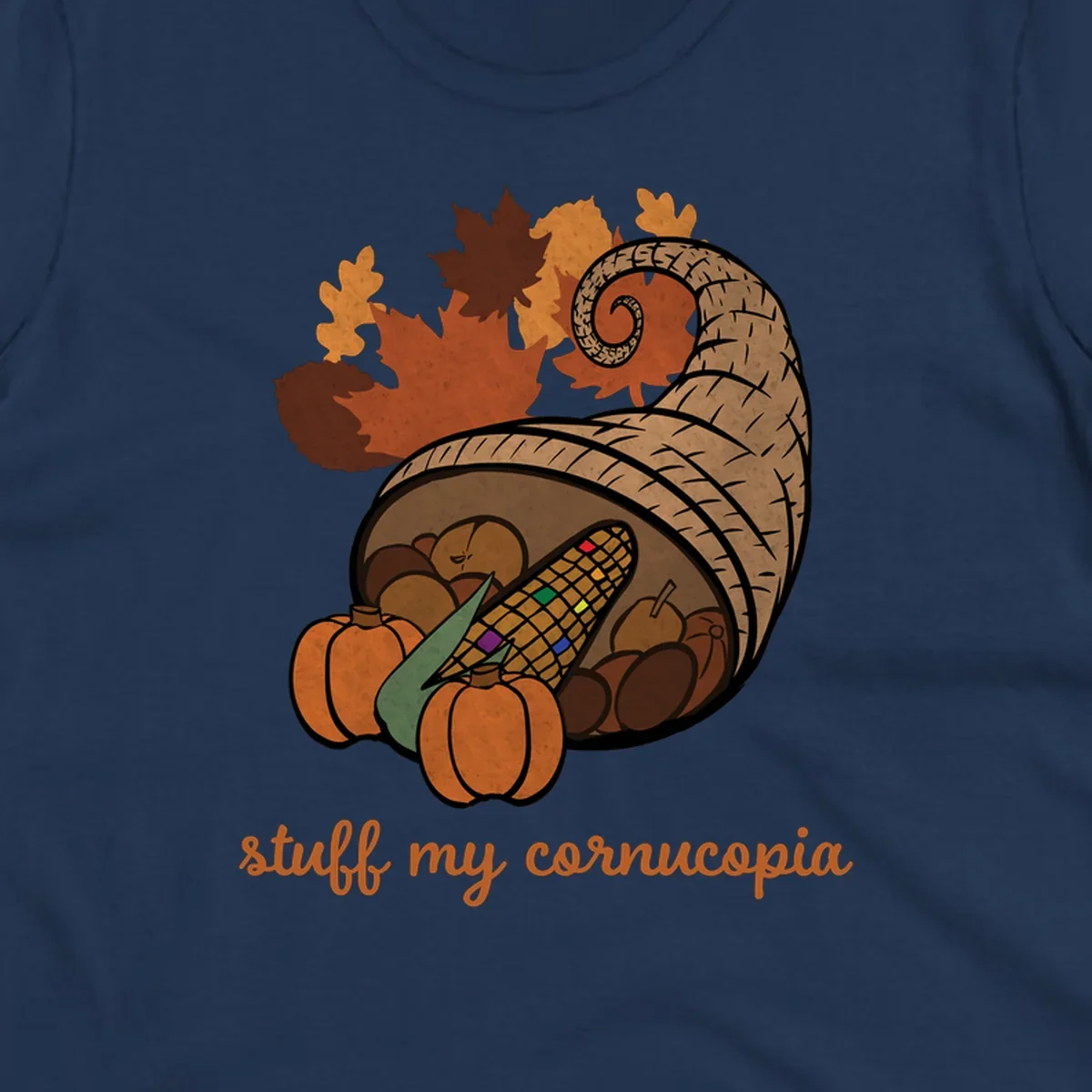 Cornucopia overflowing with harvest food and autumn leaves, with text 'stuff my cornucopia'.