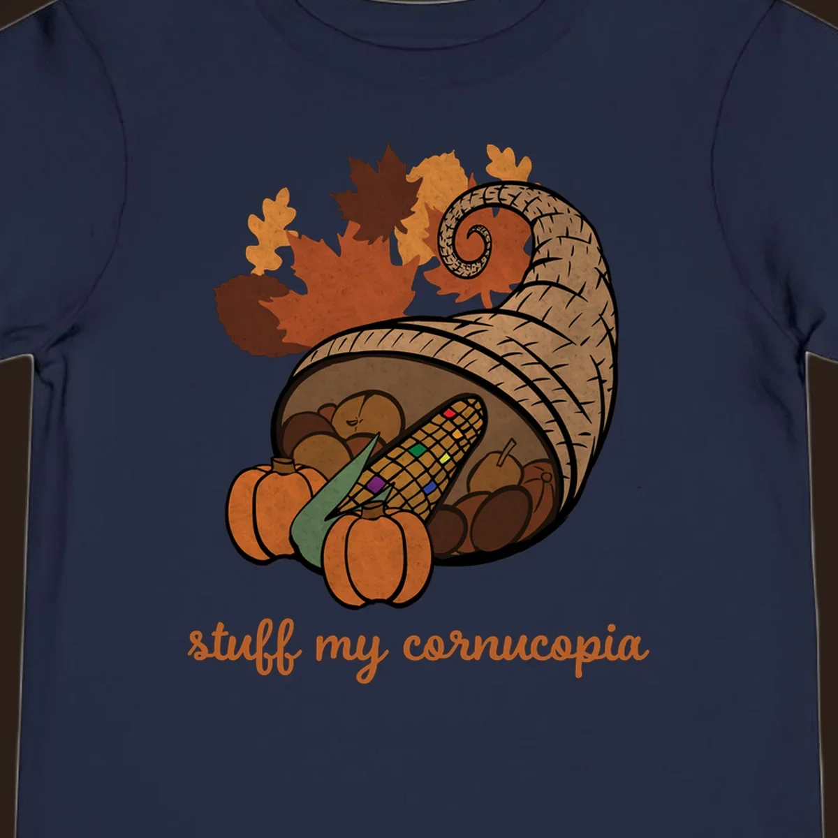 Cornucopia overflowing with harvest food and autumn leaves, with text 'stuff my cornucopia'.