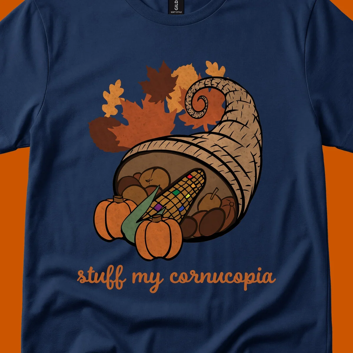 Cornucopia overflowing with harvest food and autumn leaves, with text 'stuff my cornucopia'.