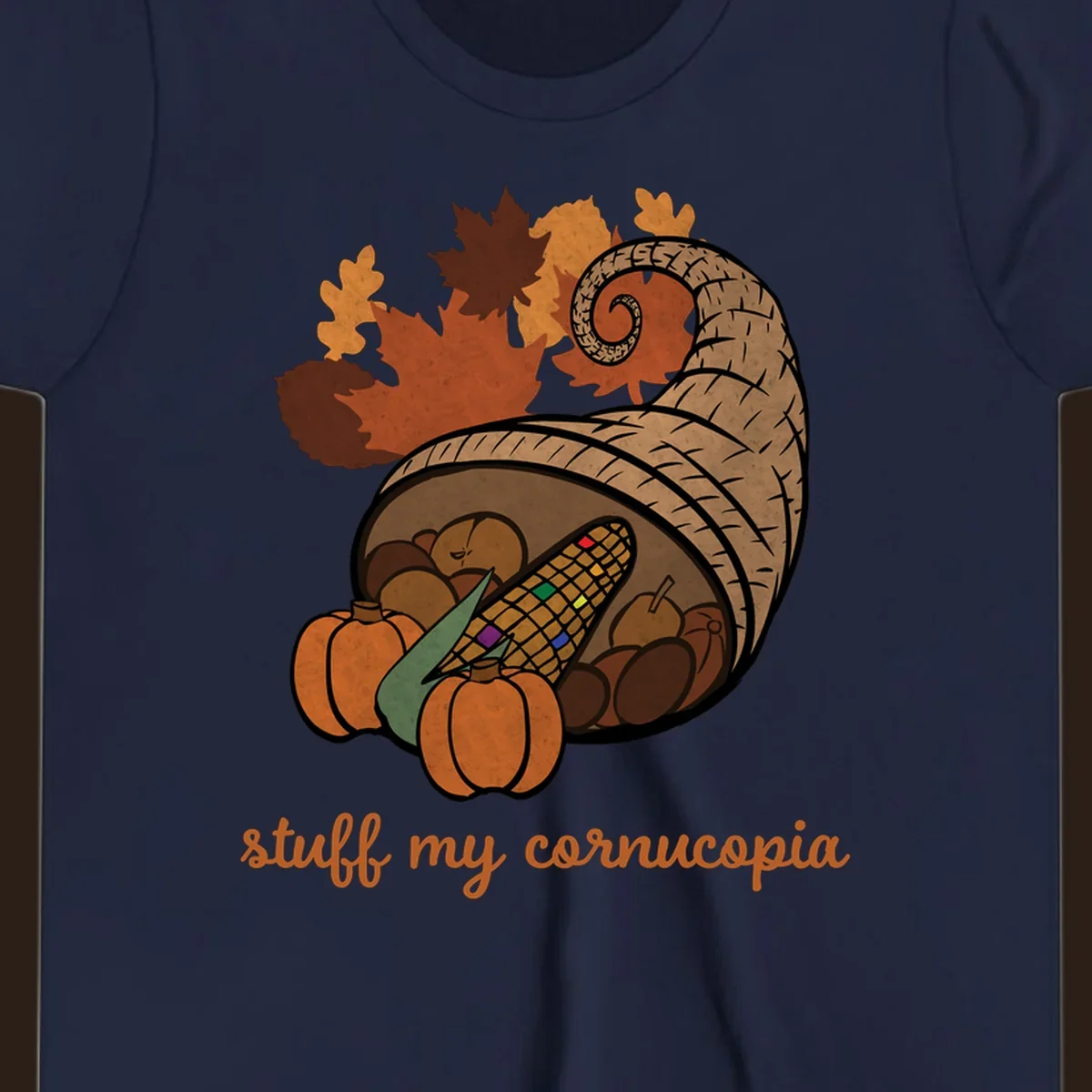 Cornucopia overflowing with harvest food and autumn leaves, with text 'stuff my cornucopia'.