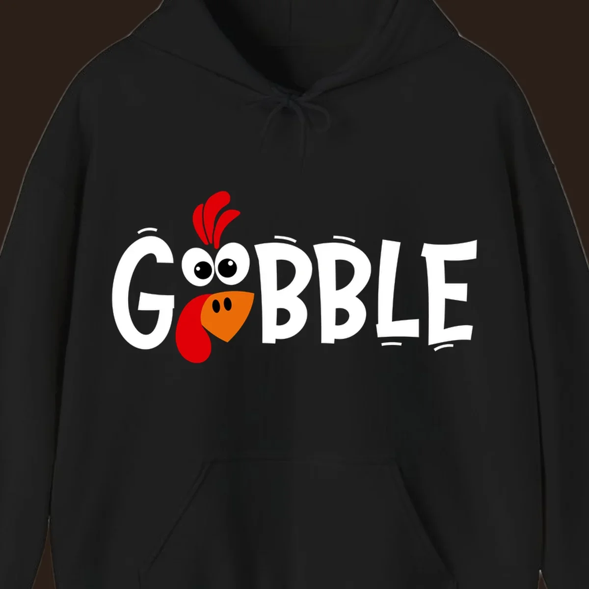 Gobble Gobble Turkey Face design with the word GOBBLE and a cartoon turkey face.
