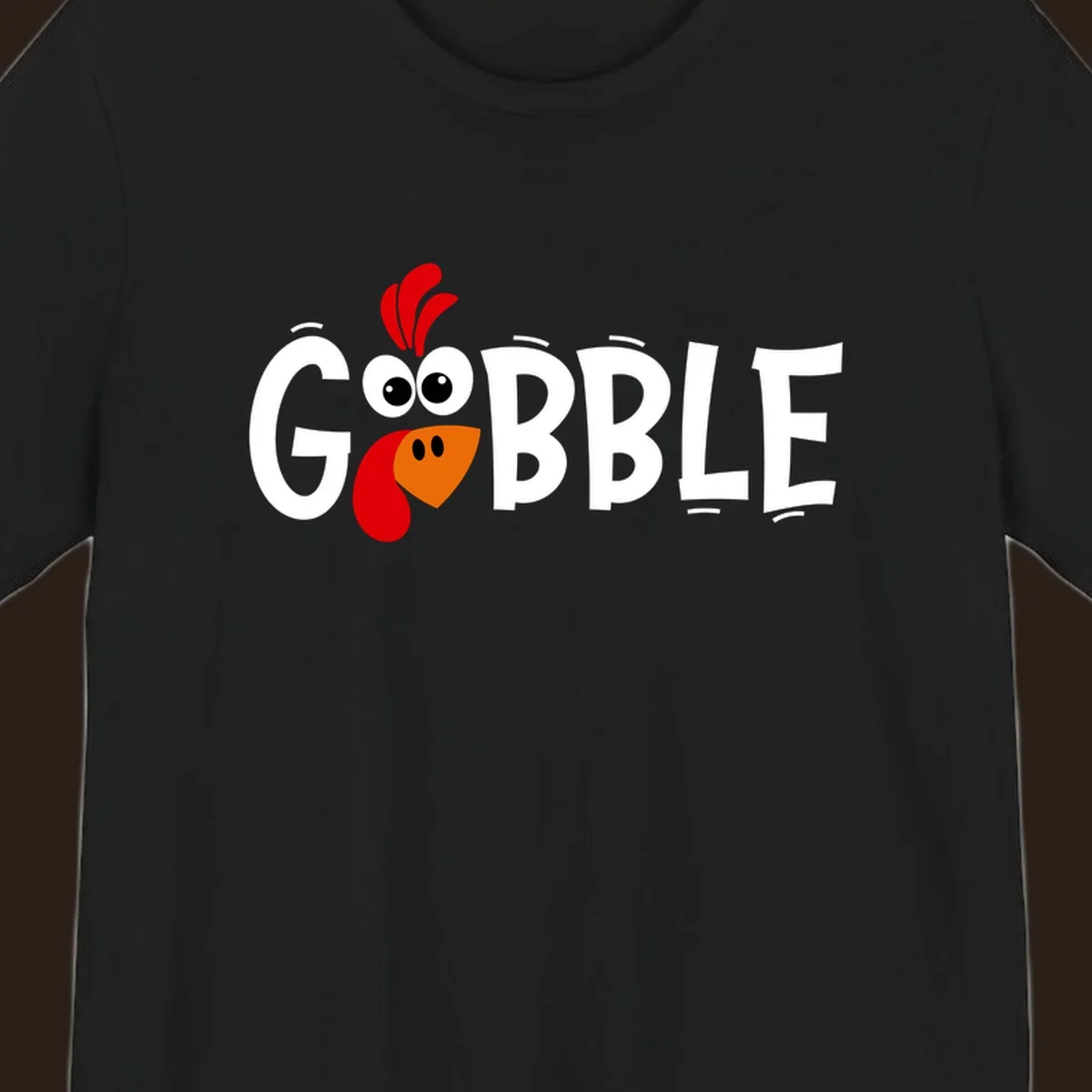 Gobble Gobble Turkey Face design with the word GOBBLE and a cartoon turkey face.
