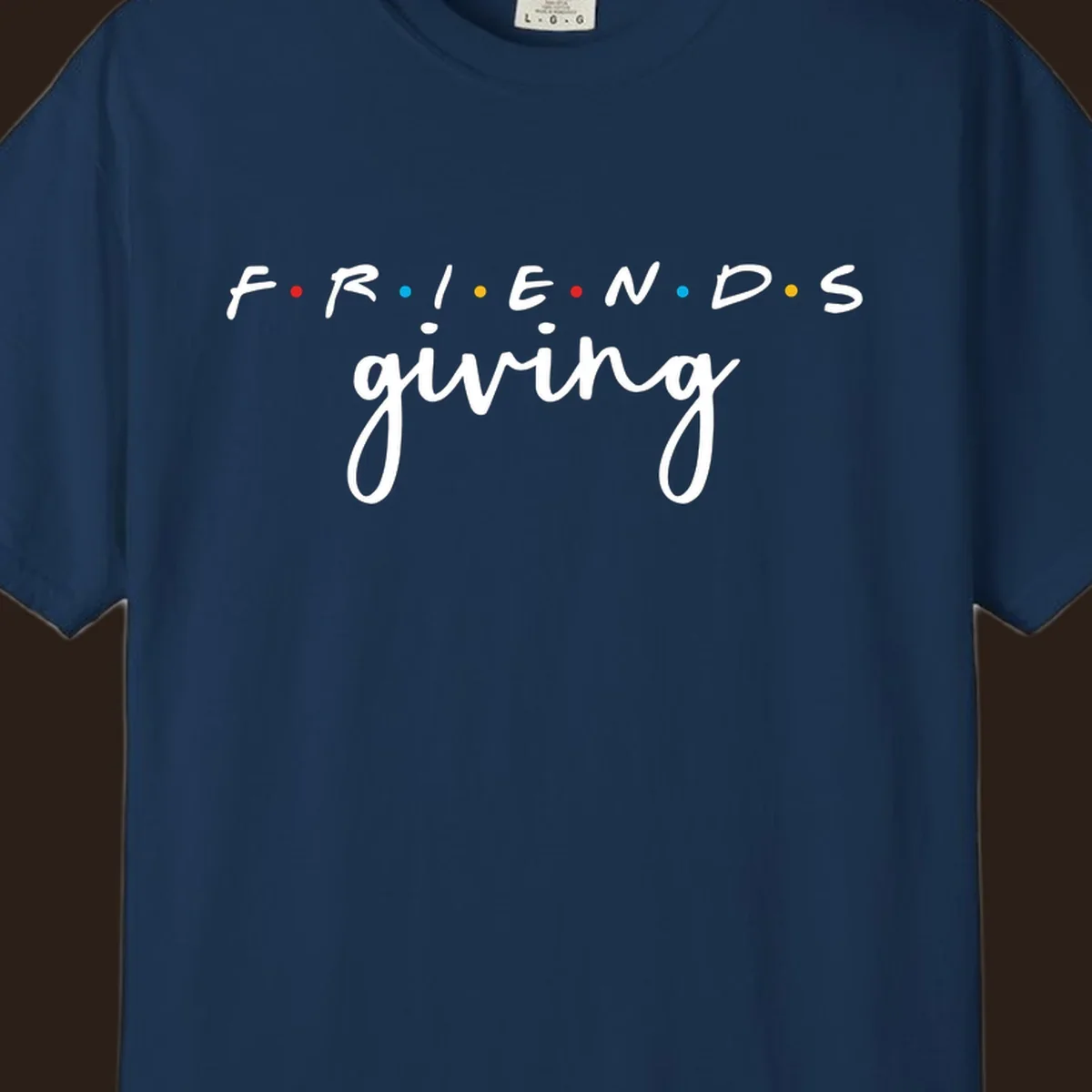Friendsgiving typography design with the word FRIENDS in the iconic TV show font and giving in a script font.