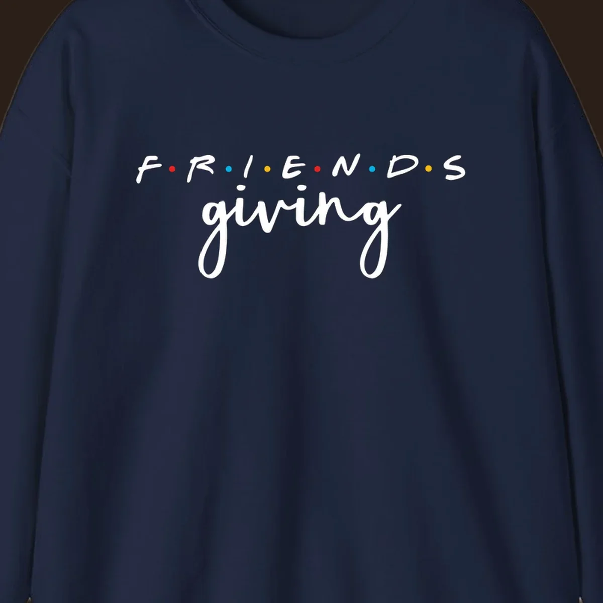 Friendsgiving typography design with the word FRIENDS in the iconic TV show font and giving in a script font.