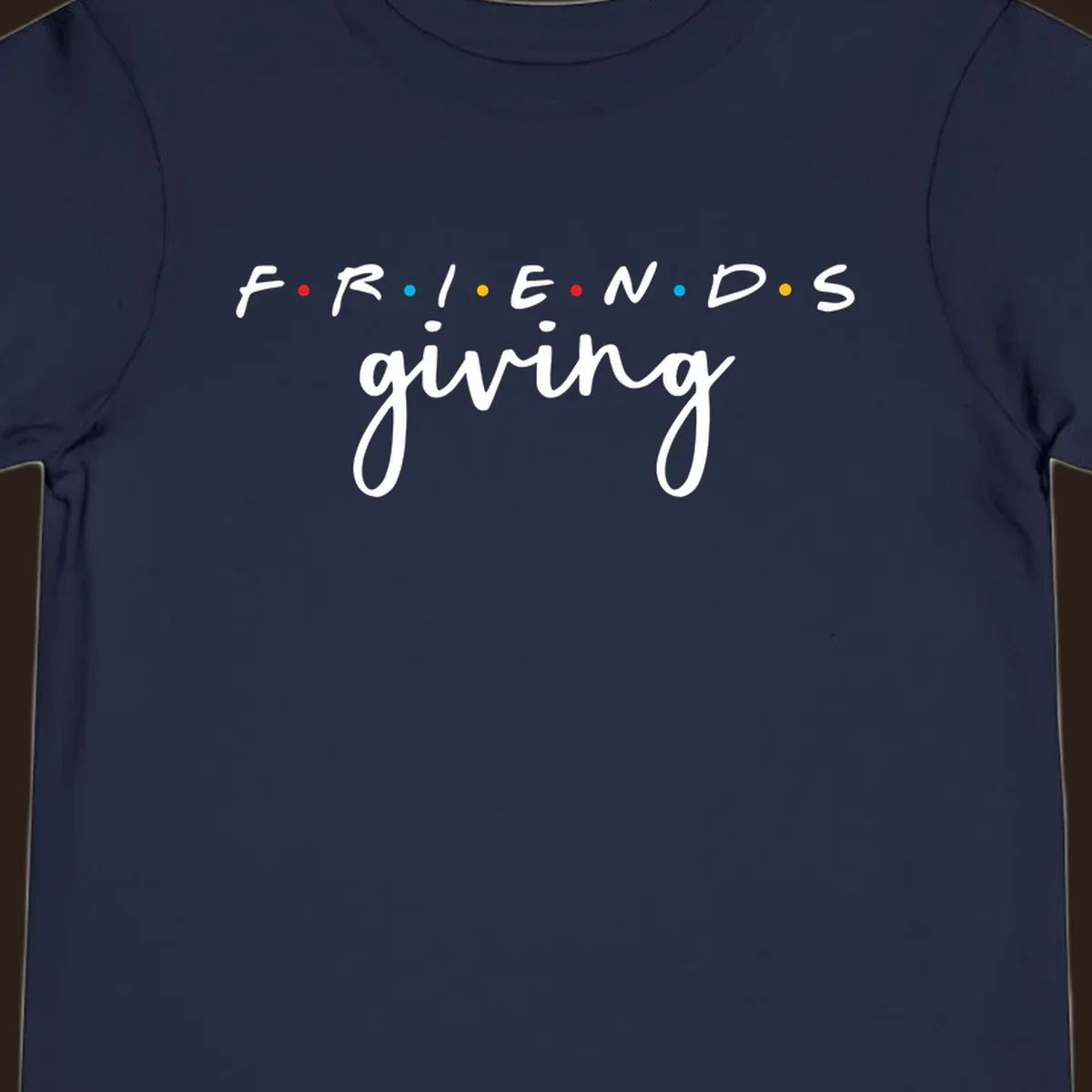 Friendsgiving typography design with the word FRIENDS in the iconic TV show font and giving in a script font.