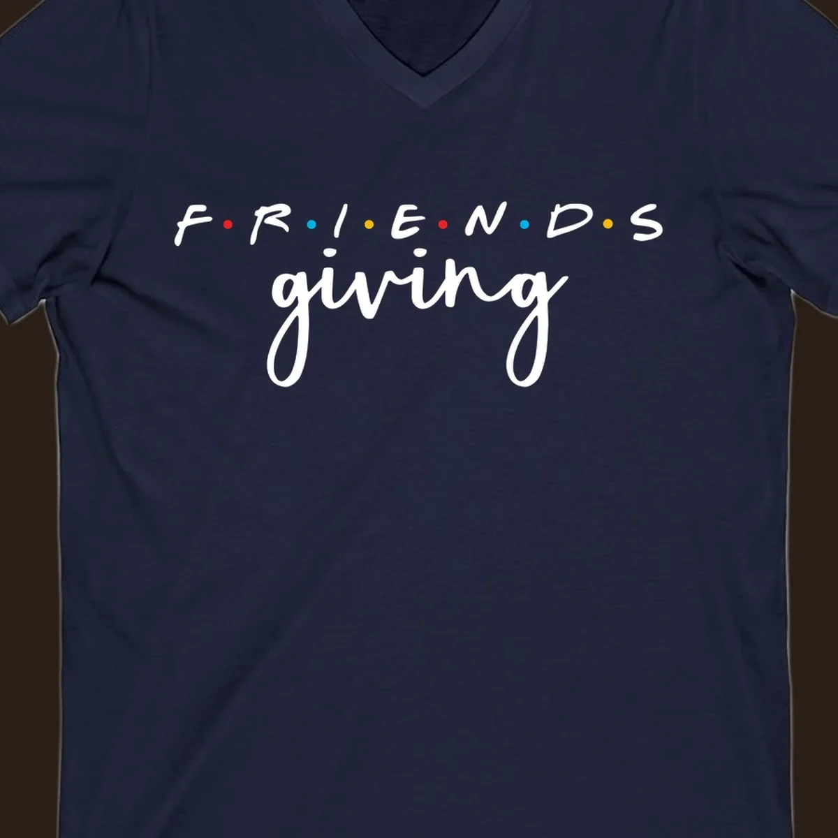 Friendsgiving typography design with the word FRIENDS in the iconic TV show font and giving in a script font.