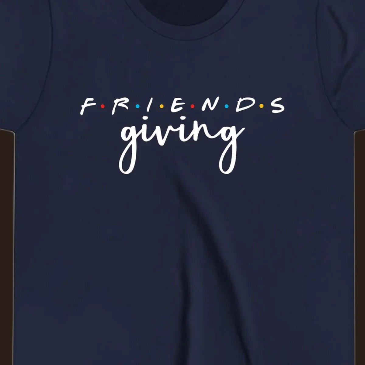 Friendsgiving typography design with the word FRIENDS in the iconic TV show font and giving in a script font.