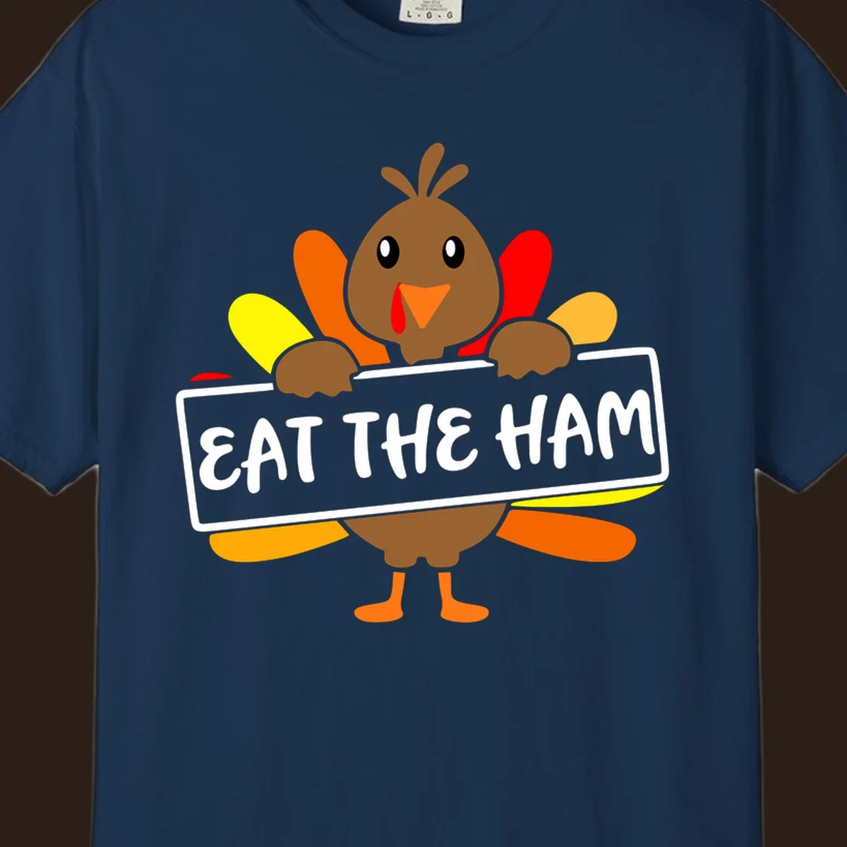 Cartoon turkey holding a sign that says EAT THE HAM, thanksgiving holiday.