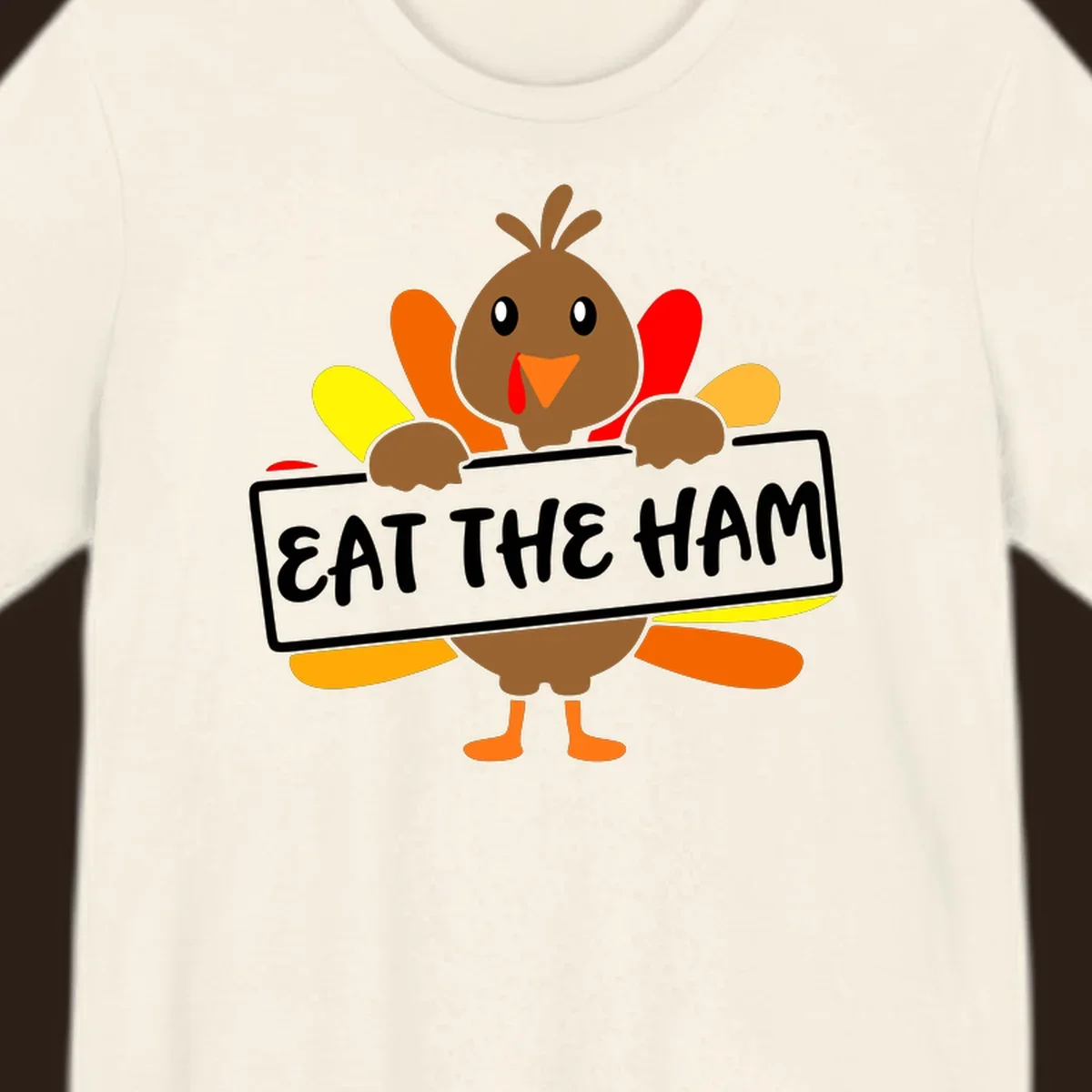 Cartoon turkey holding a sign that says EAT THE HAM, thanksgiving holiday.