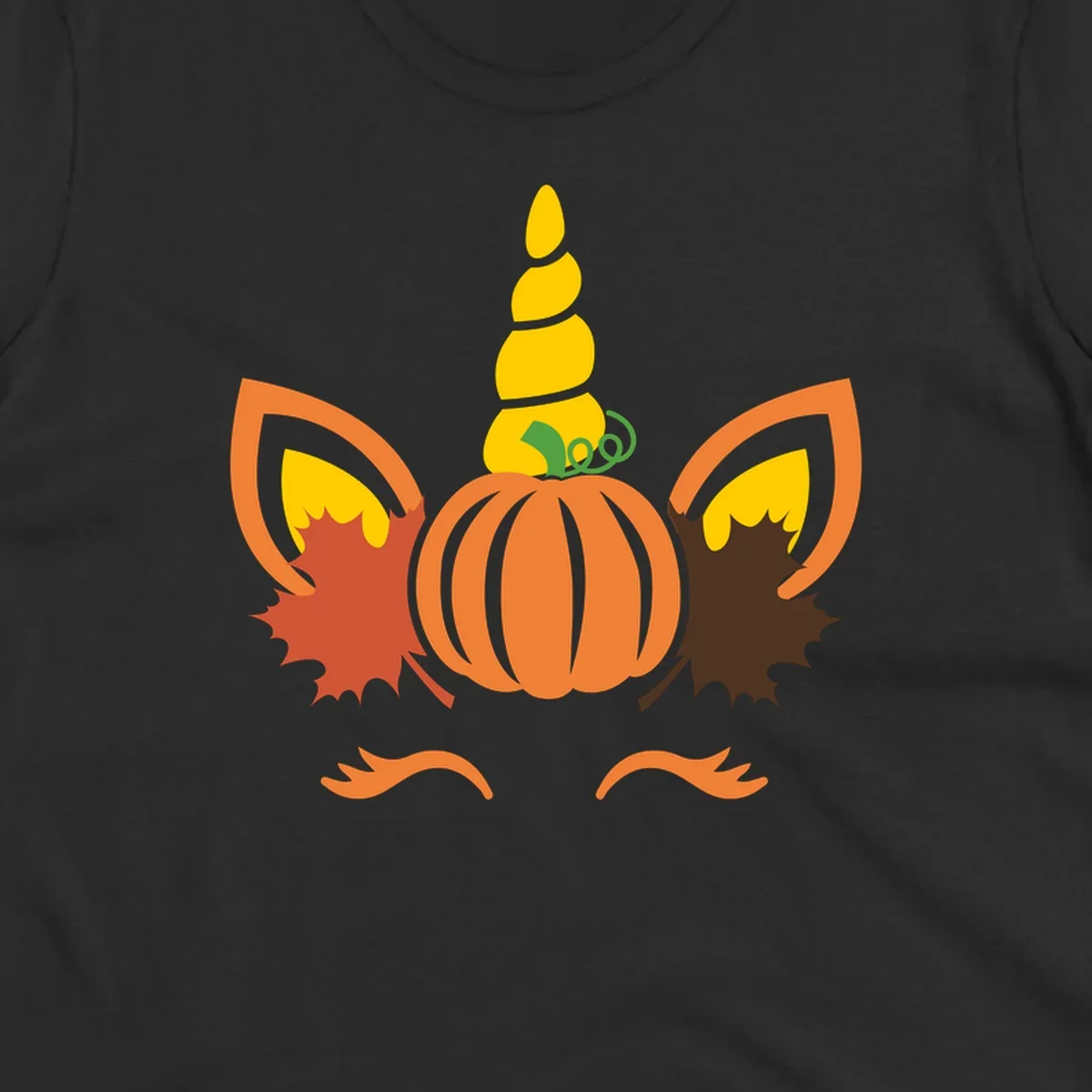 Autumn unicorn pumpkin face with fall leaves graphic.