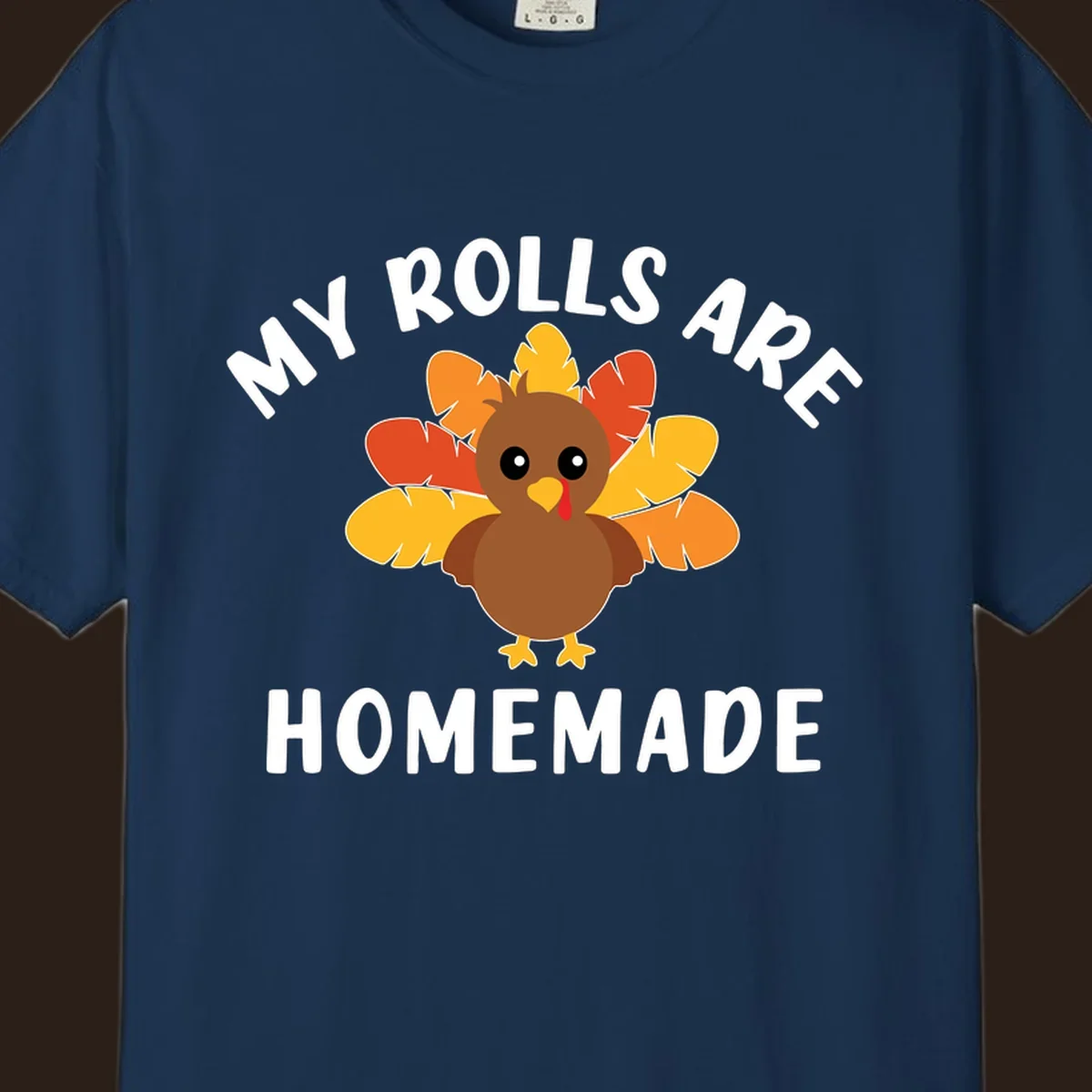 Cute turkey with colorful feathers and text 'My Rolls Are Homemade', Thanksgiving design.