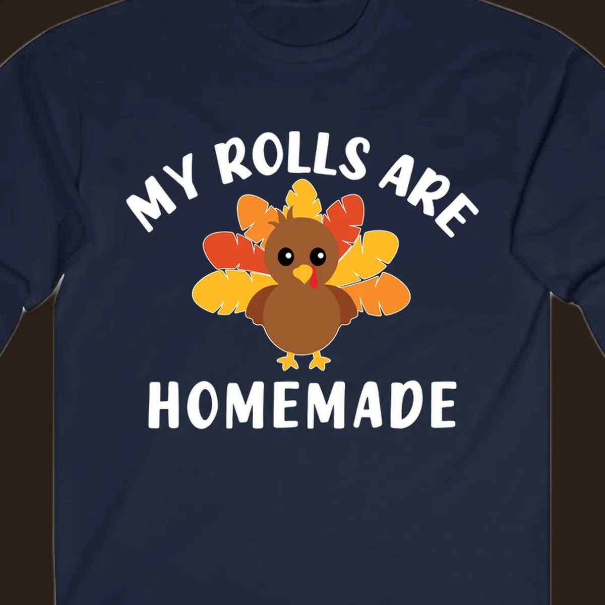 Cute turkey with colorful feathers and text 'My Rolls Are Homemade', Thanksgiving design.