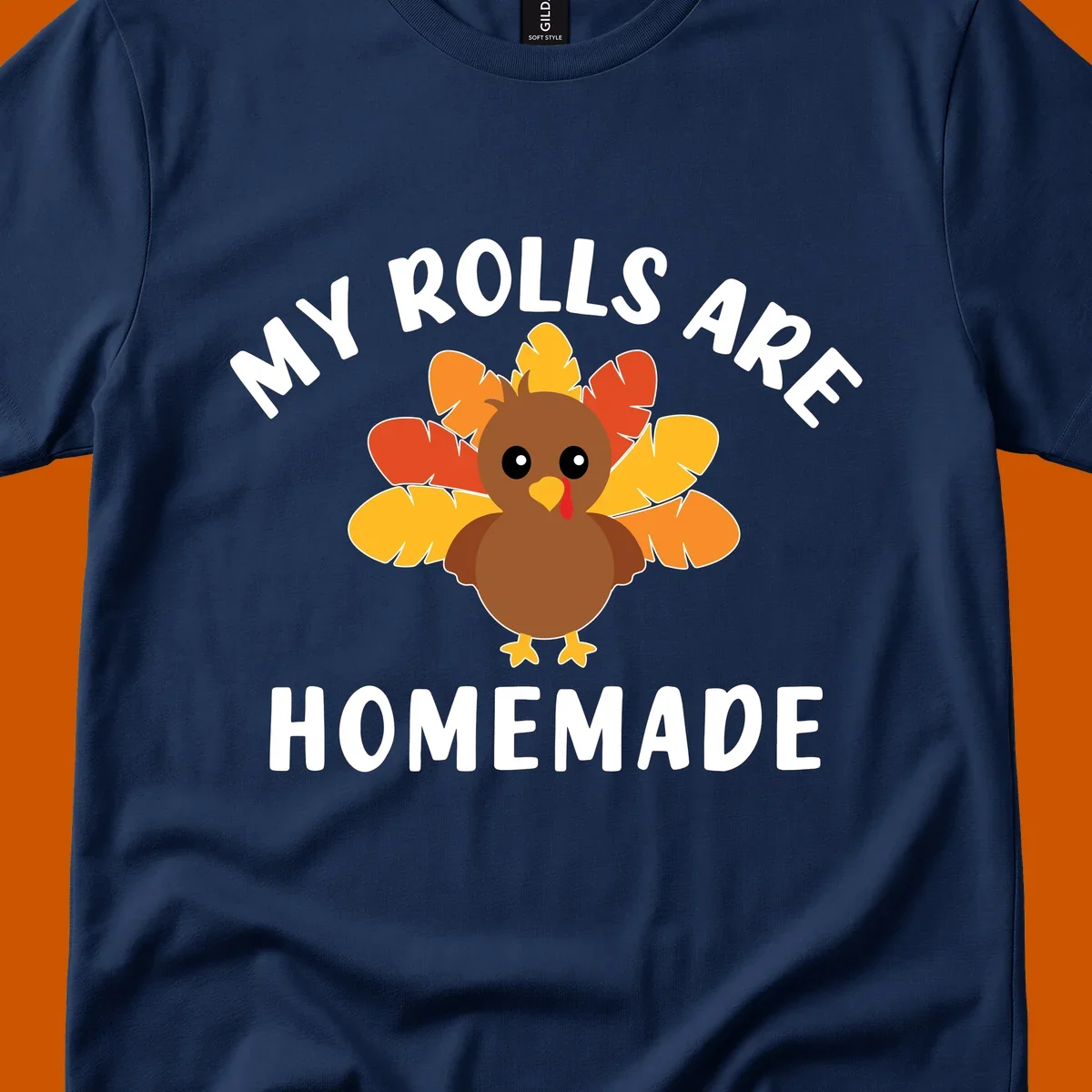 Cute turkey with colorful feathers and text 'My Rolls Are Homemade', Thanksgiving design.