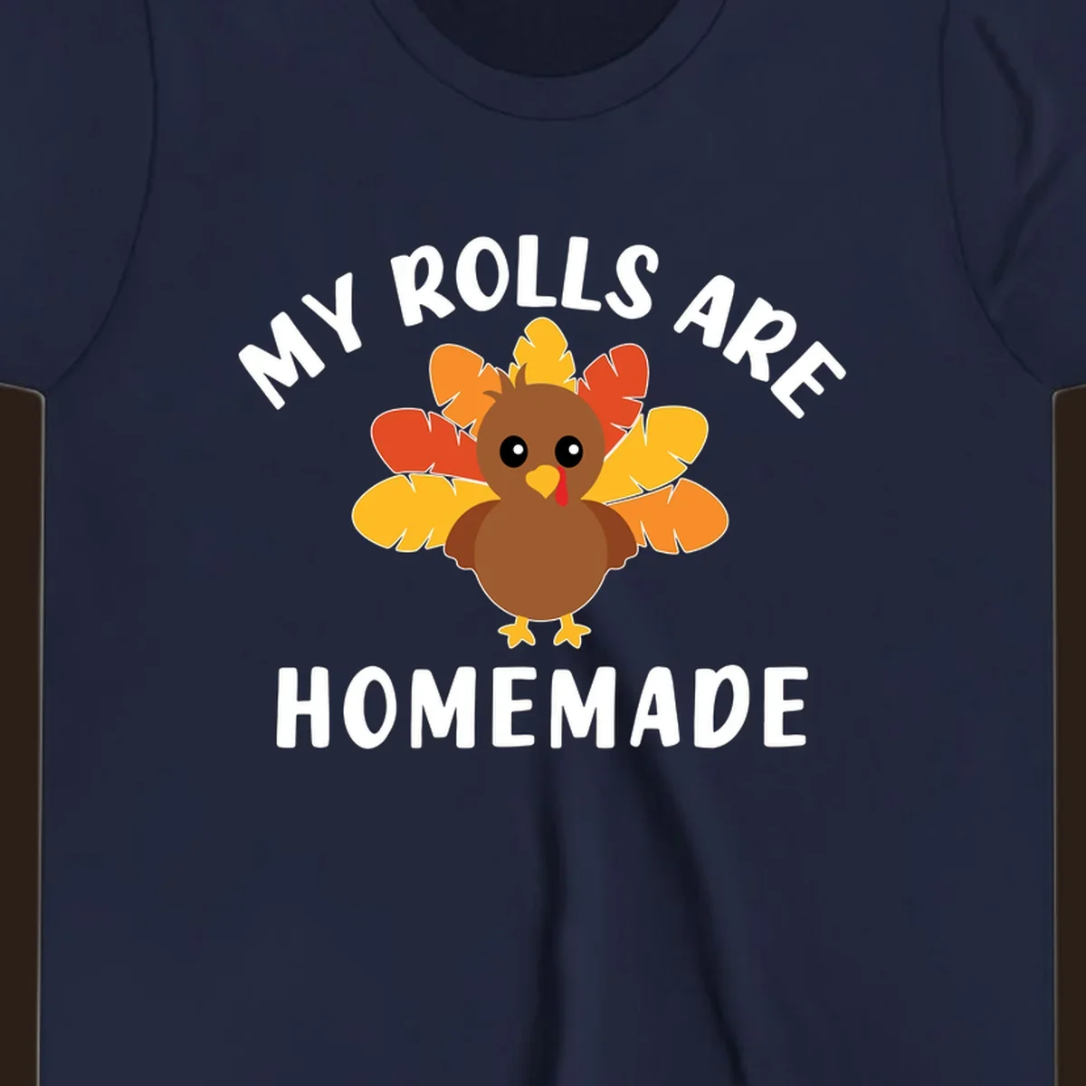 Cute turkey with colorful feathers and text 'My Rolls Are Homemade', Thanksgiving design.