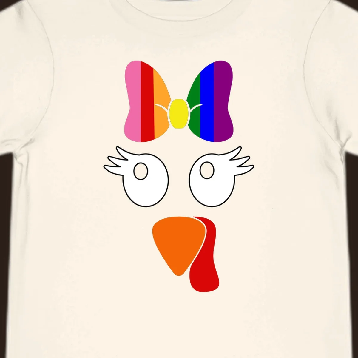 Rainbow turkey face with a bow, graphic for Thanksgiving.