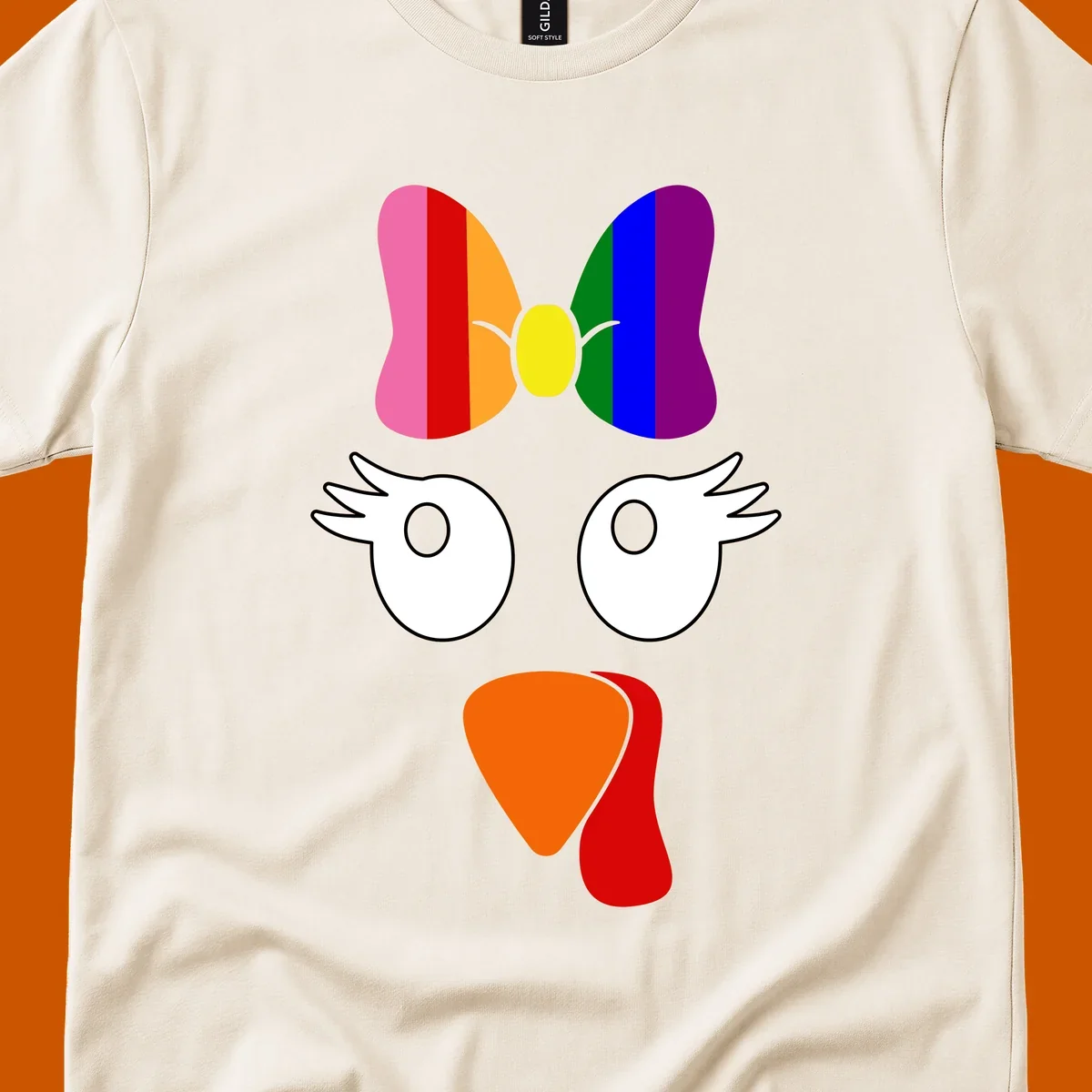 Rainbow turkey face with a bow, graphic for Thanksgiving.