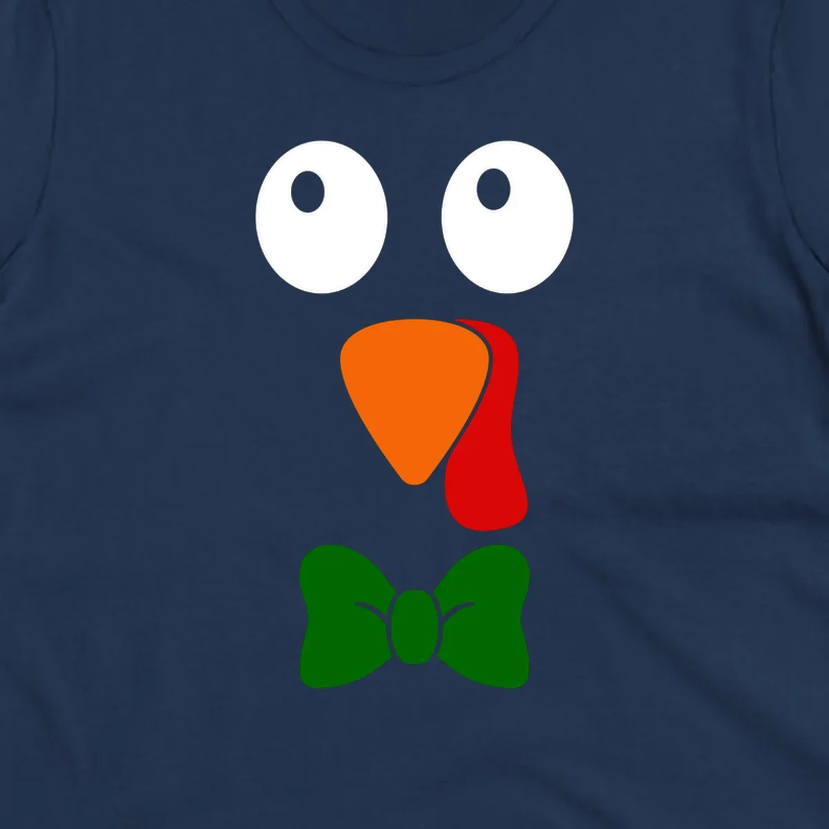 Cute turkey face with bowtie graphic for Thanksgiving.