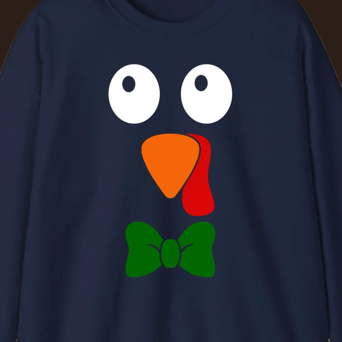 Cute turkey face with bowtie graphic for Thanksgiving.