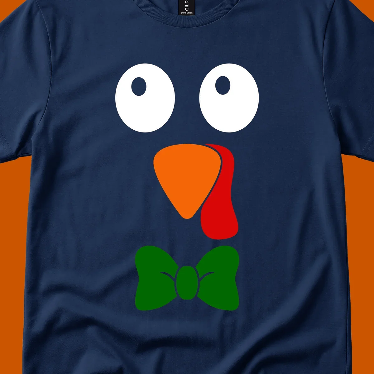 Cute turkey face with bowtie graphic for Thanksgiving.