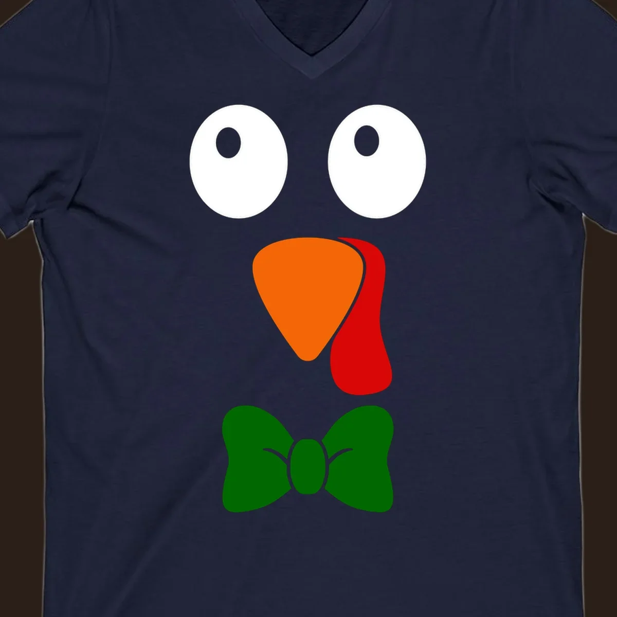 Cute turkey face with bowtie graphic for Thanksgiving.