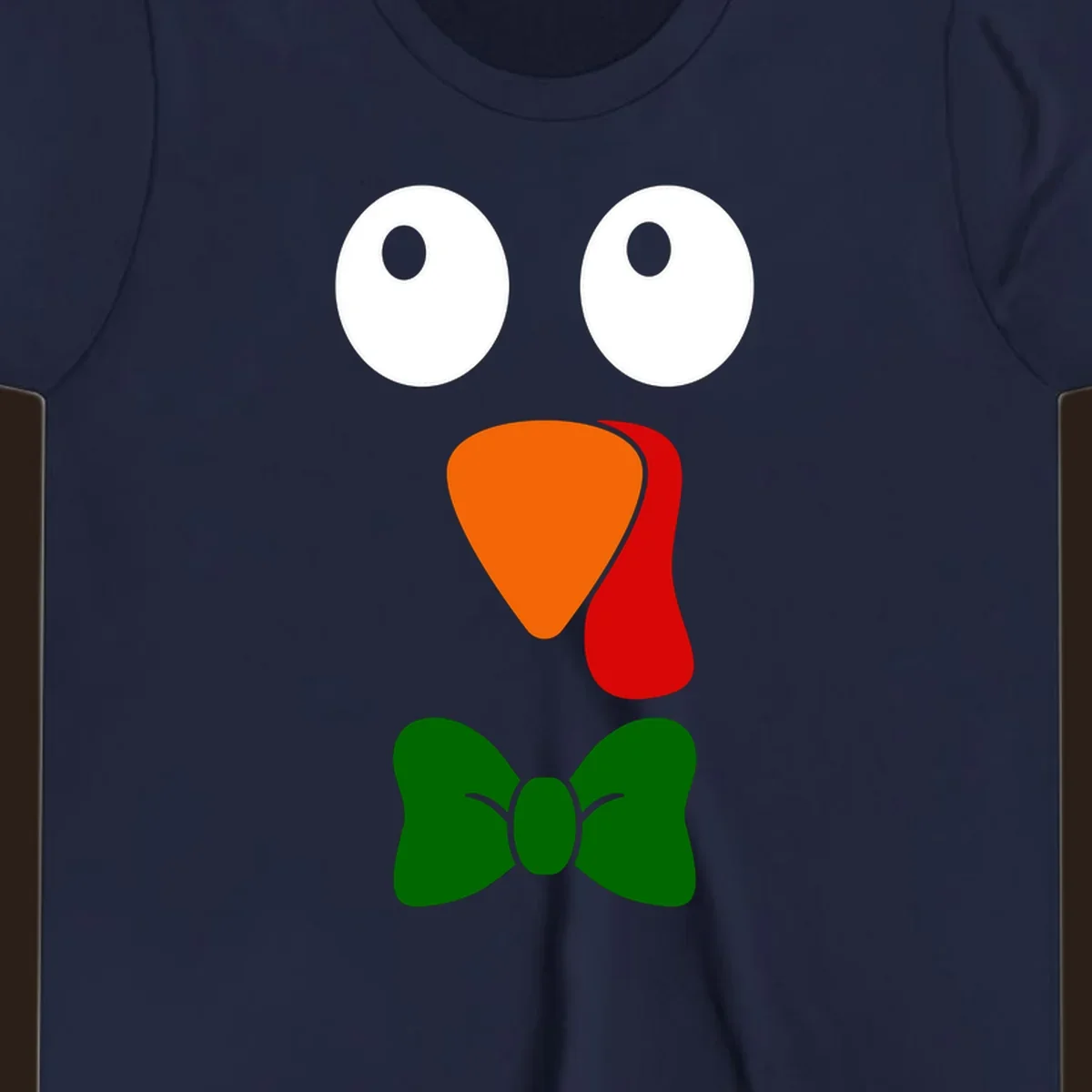 Cute turkey face with bowtie graphic for Thanksgiving.