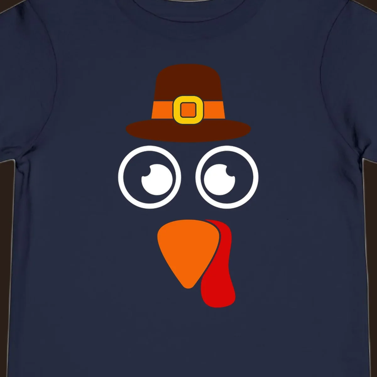 Cute Thanksgiving turkey face with pilgrim hat.