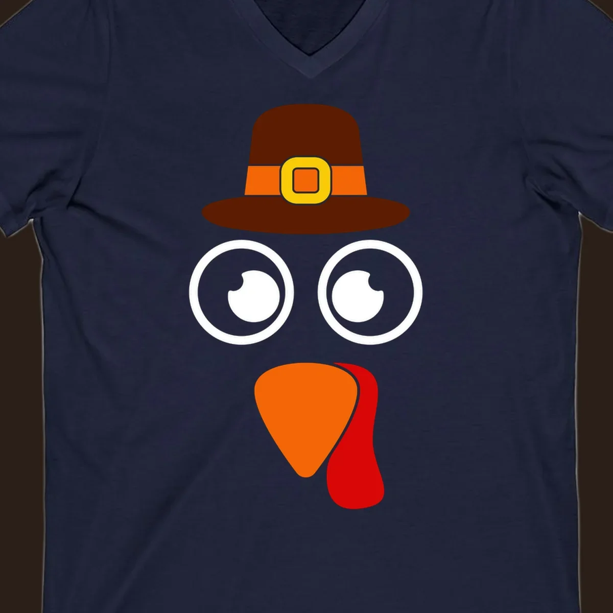 Cute Thanksgiving turkey face with pilgrim hat.