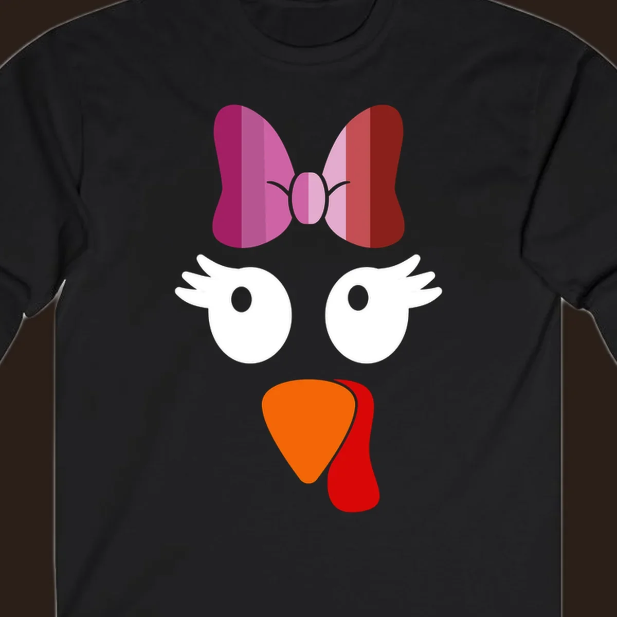 Cute lesbian turkey face with pink and purple bow. Thanksgiving graphic.