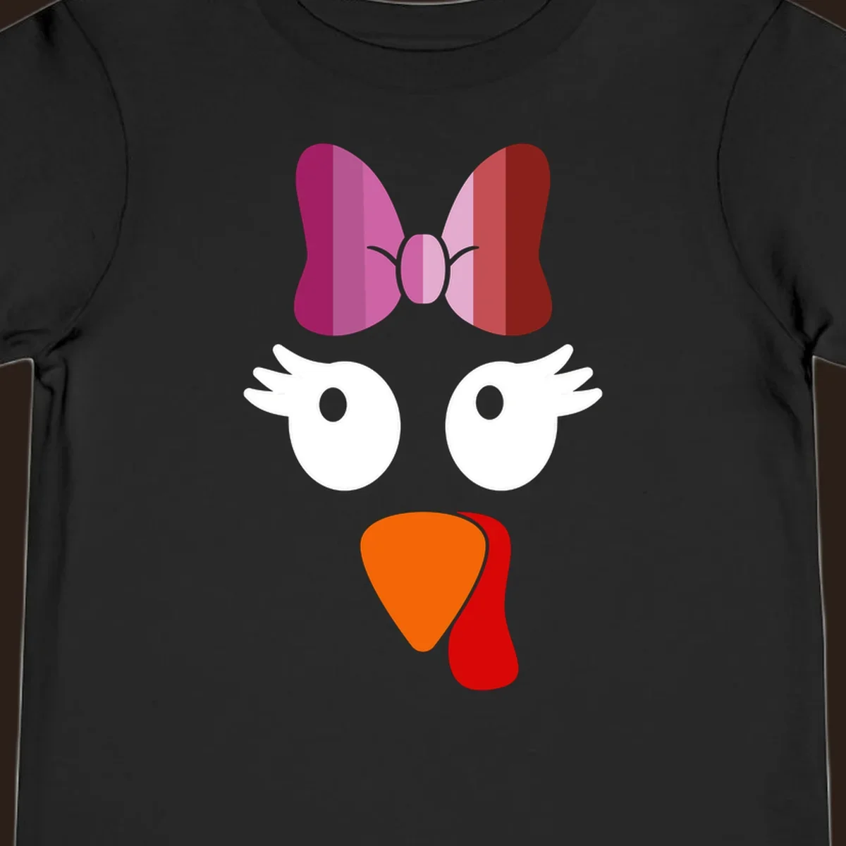 Cute lesbian turkey face with pink and purple bow. Thanksgiving graphic.