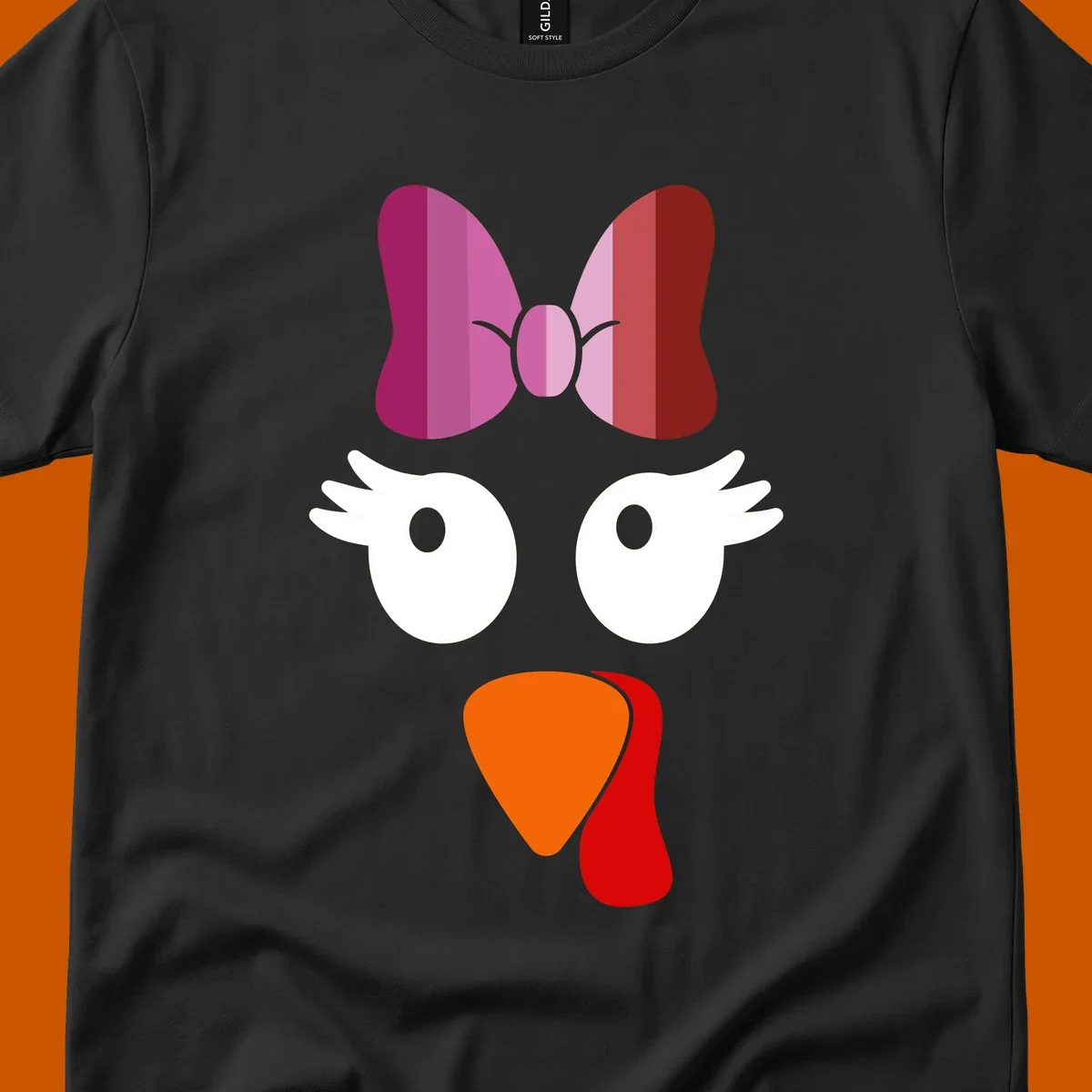 Cute lesbian turkey face with pink and purple bow. Thanksgiving graphic.