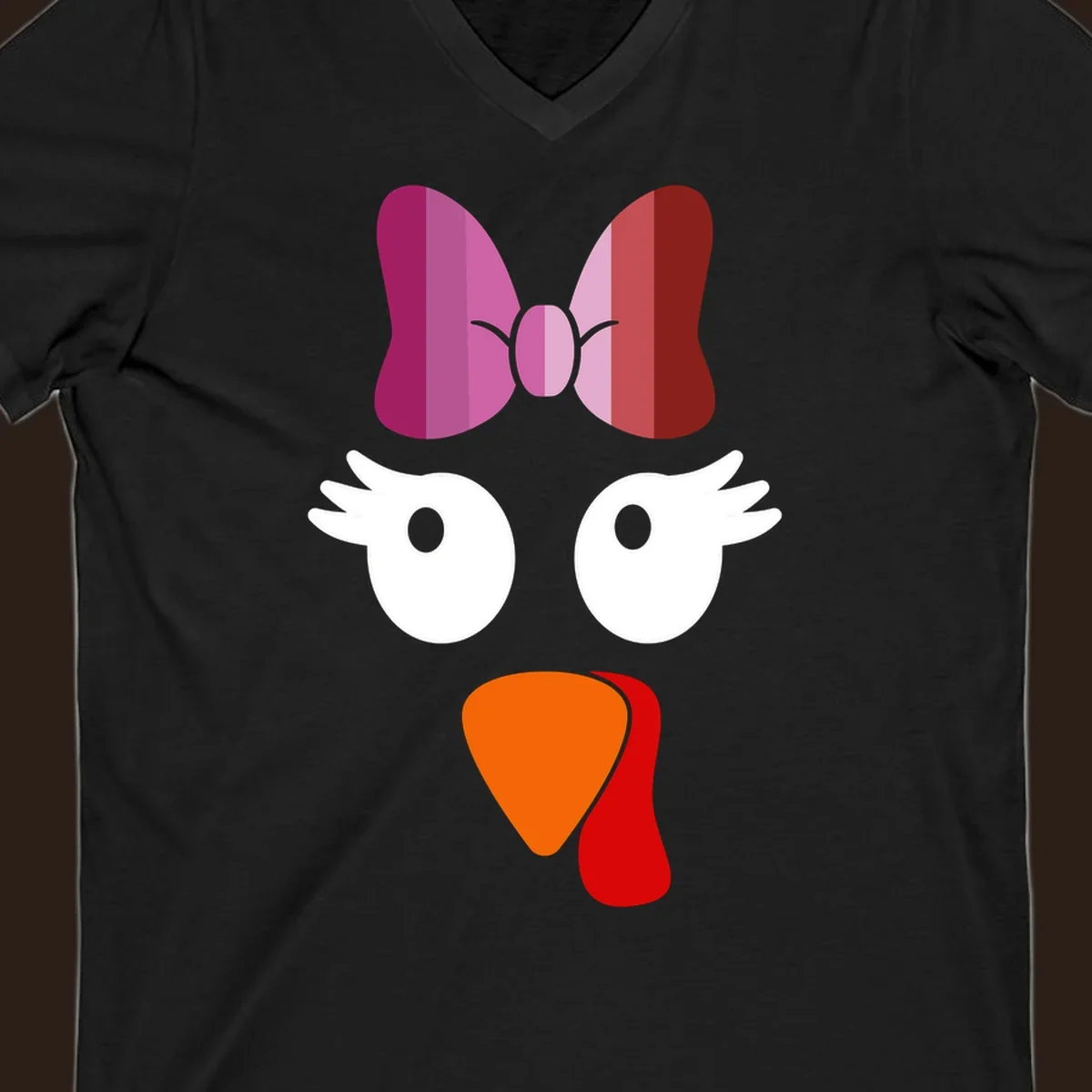 Cute lesbian turkey face with pink and purple bow. Thanksgiving graphic.
