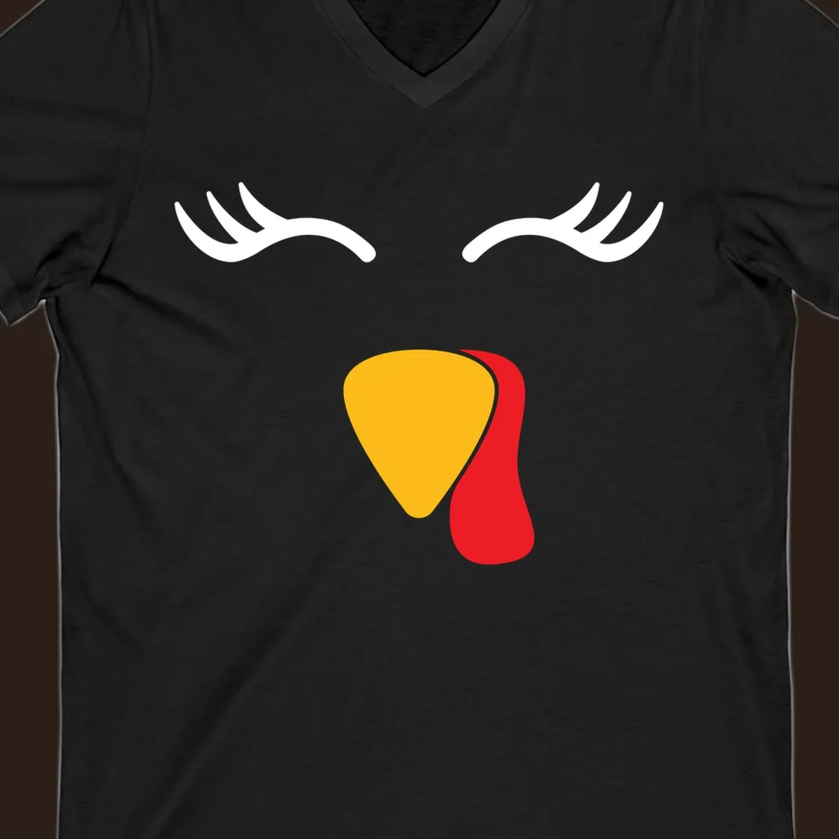 Funny turkey face illustration with white eyelashes and yellow wattle, thanksgiving graphic.