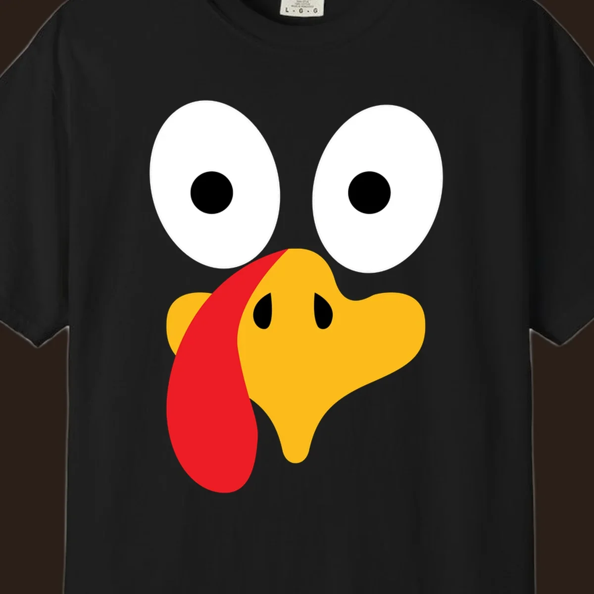 Googly-eyed turkey face illustration for Thanksgiving.