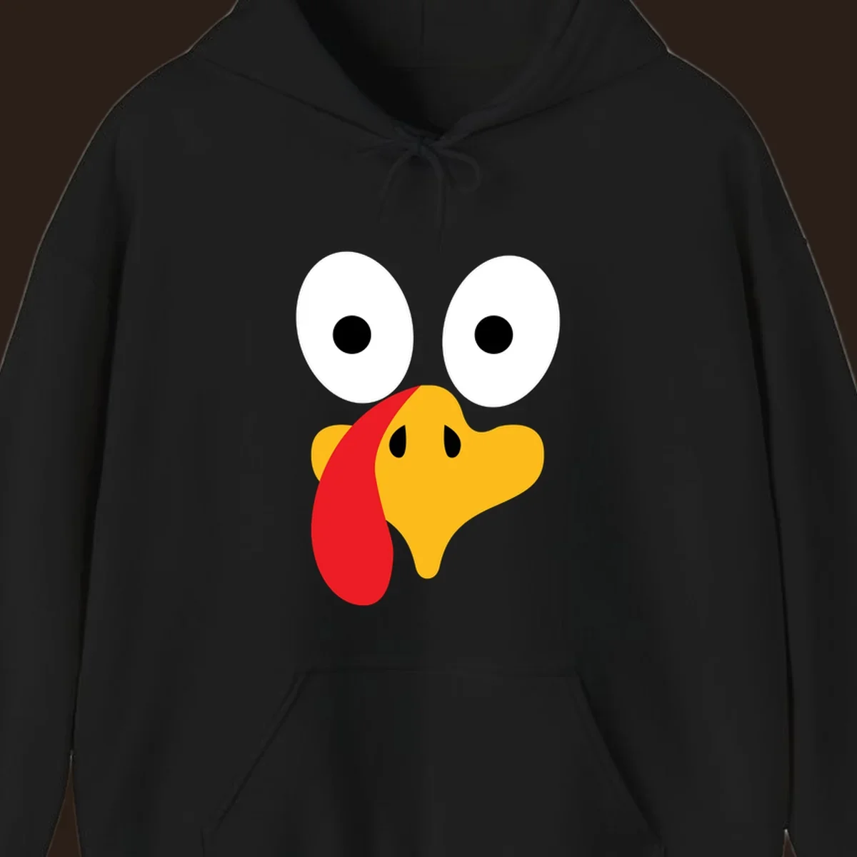 Googly-eyed turkey face illustration for Thanksgiving.