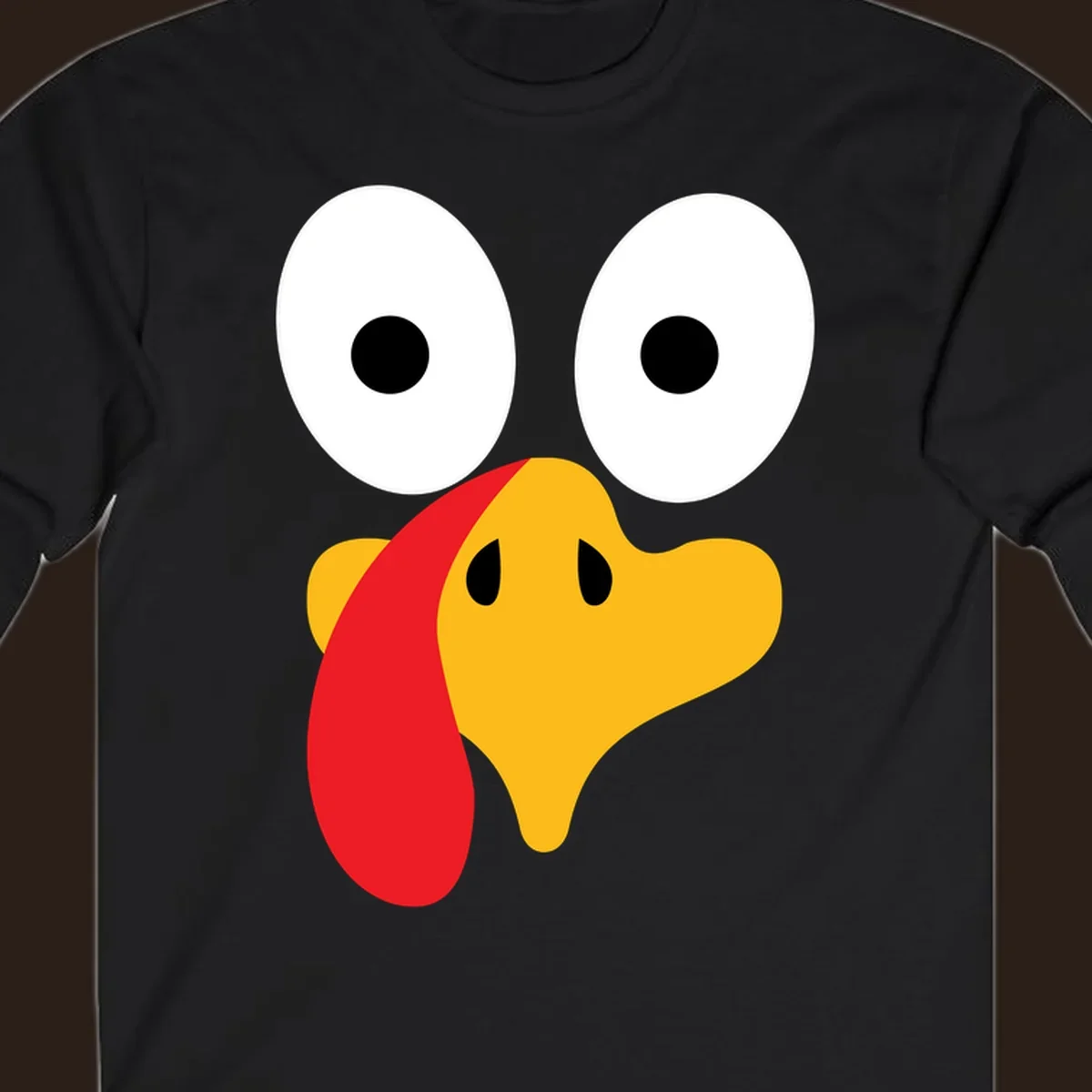 Googly-eyed turkey face illustration for Thanksgiving.