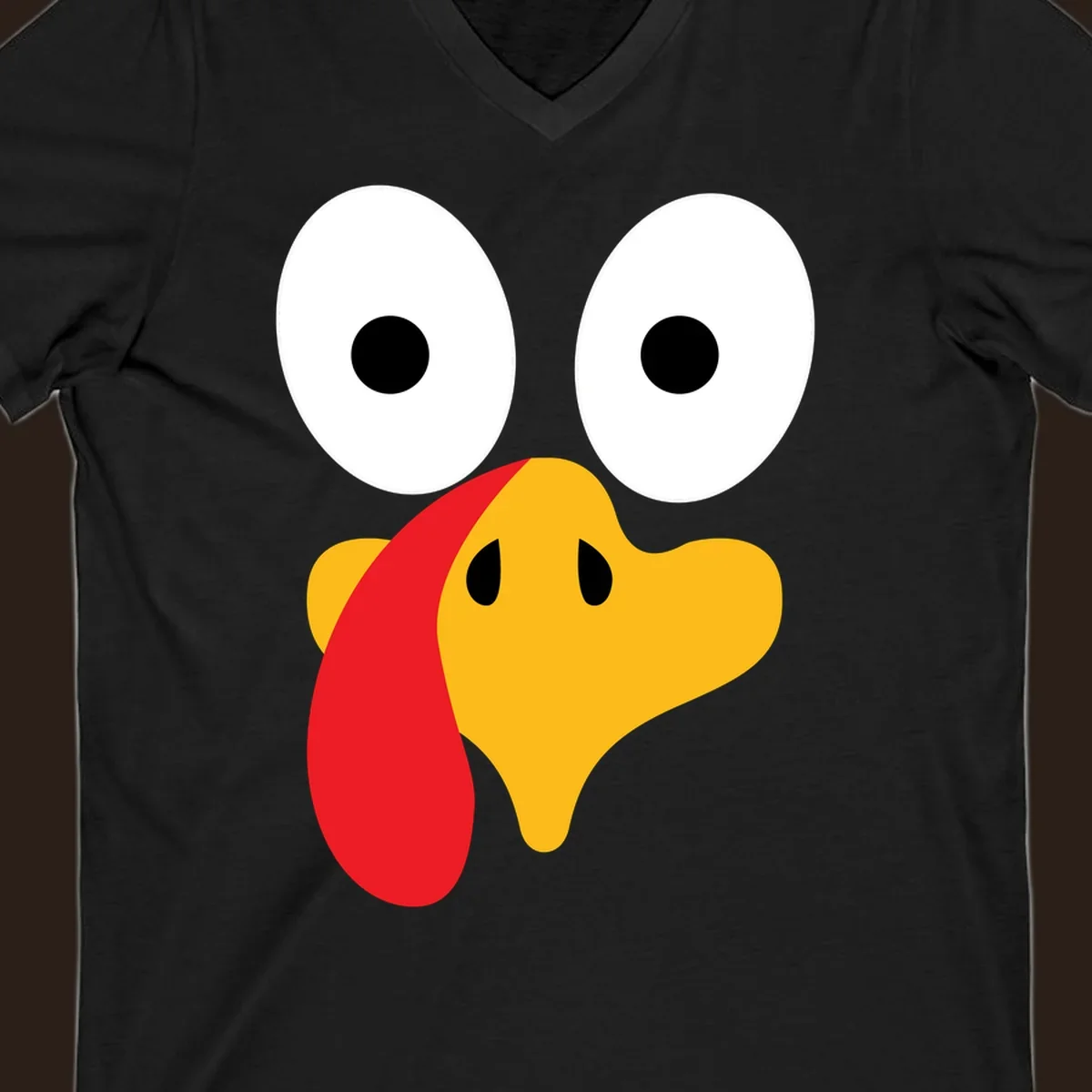 Googly-eyed turkey face illustration for Thanksgiving.