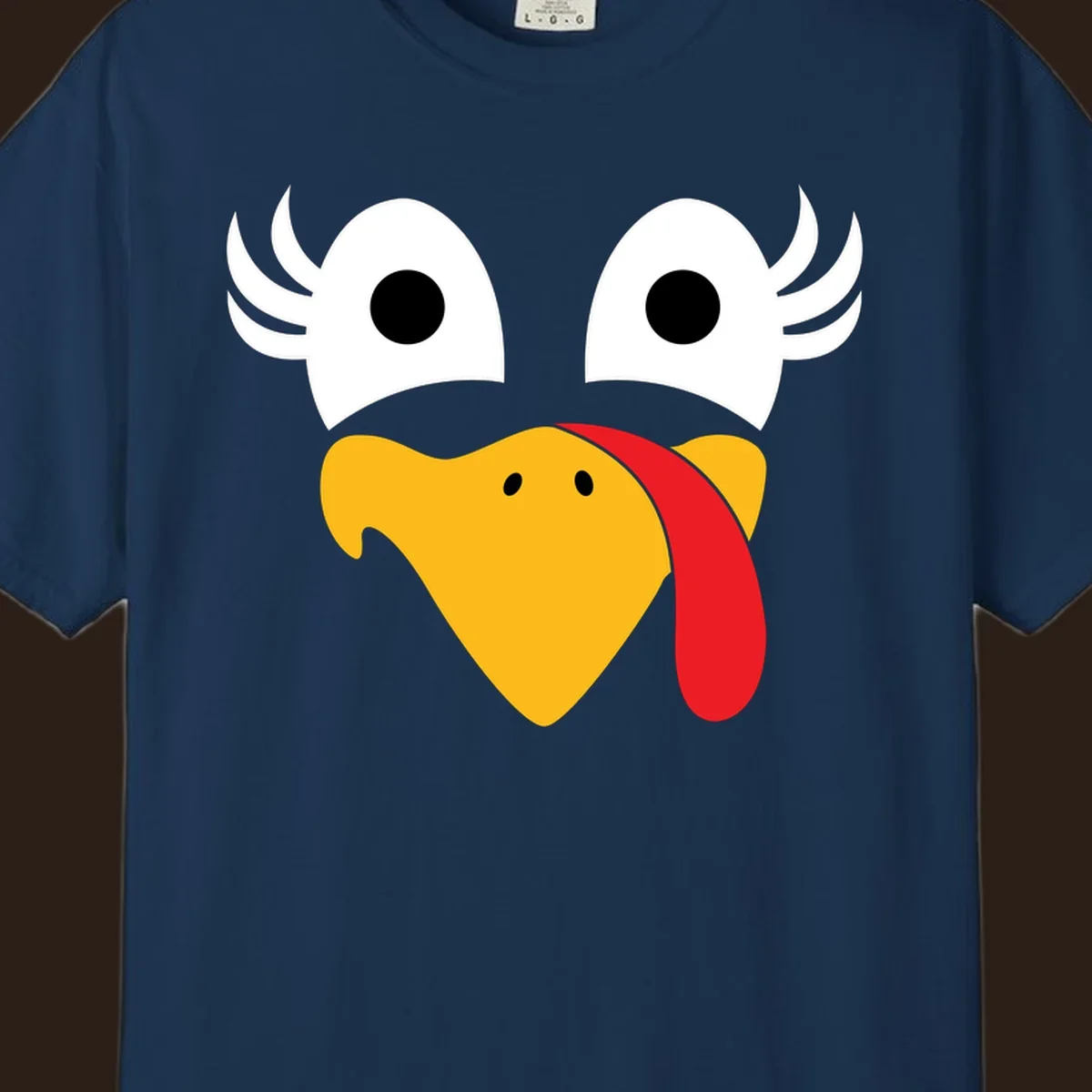 Funny turkey face illustration with googly eyes and a red wattle, for Thanksgiving.