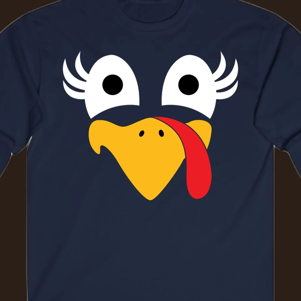Funny turkey face illustration with googly eyes and a red wattle, for Thanksgiving.