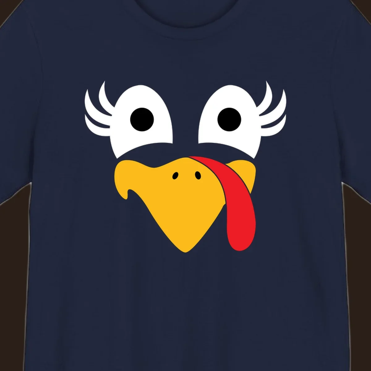 Funny turkey face illustration with googly eyes and a red wattle, for Thanksgiving.