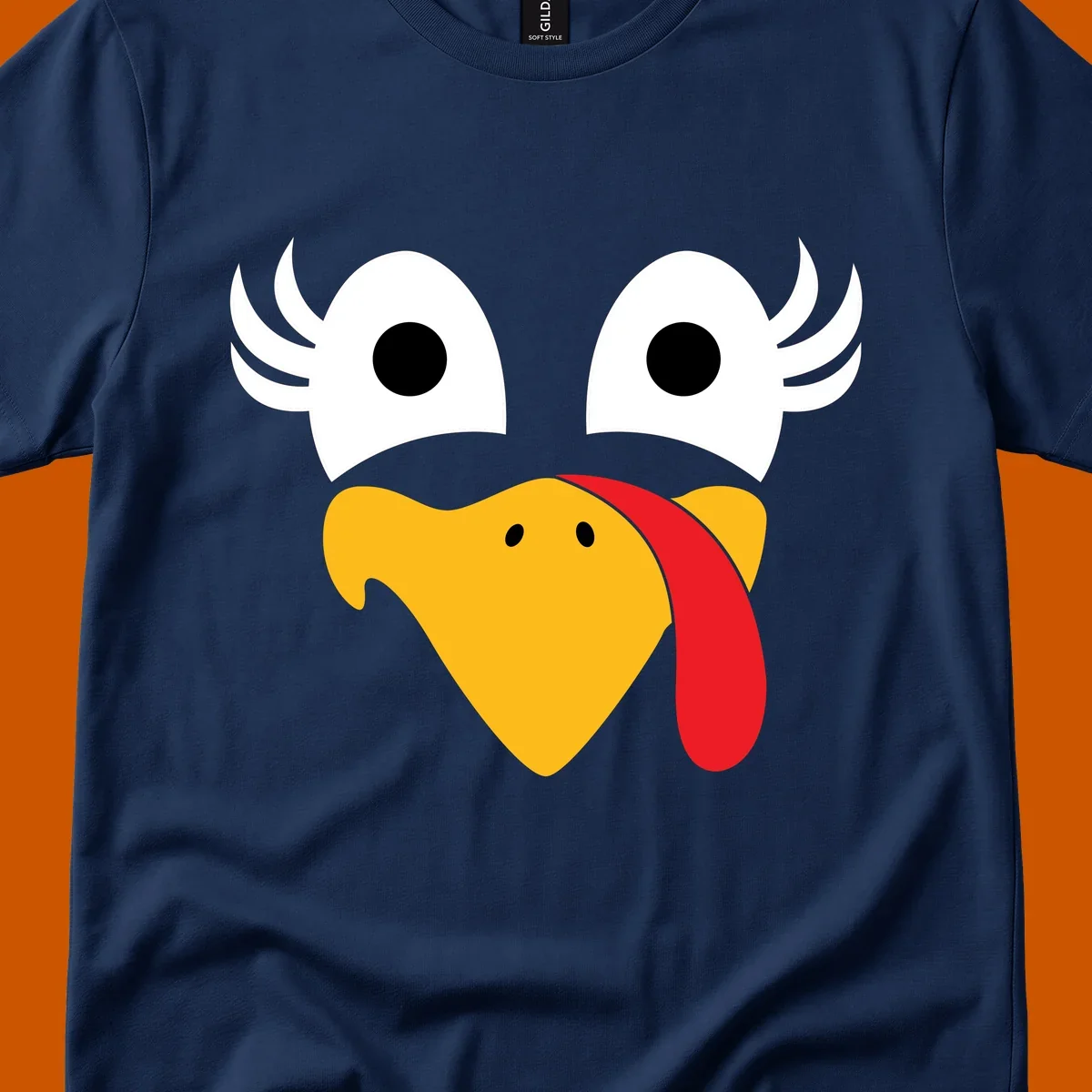 Funny turkey face illustration with googly eyes and a red wattle, for Thanksgiving.