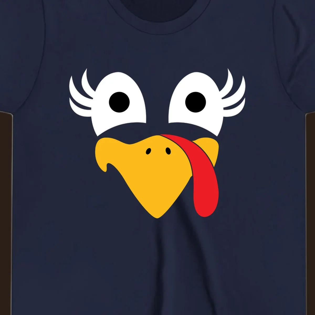 Funny turkey face illustration with googly eyes and a red wattle, for Thanksgiving.