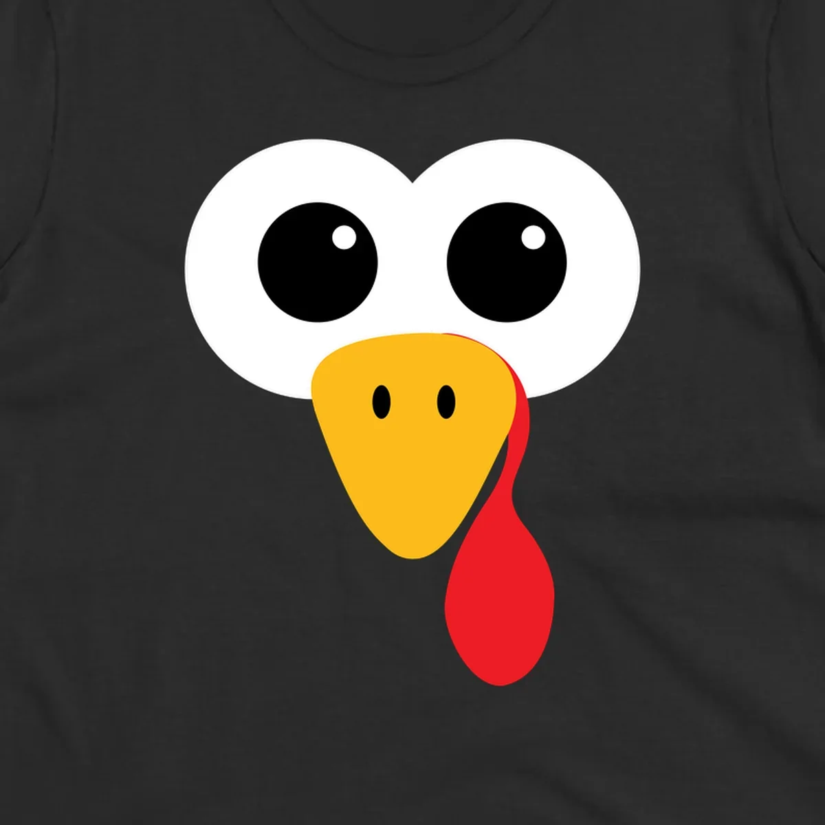 Funny turkey face with googly eyes, yellow beak, and red wattle for Thanksgiving.