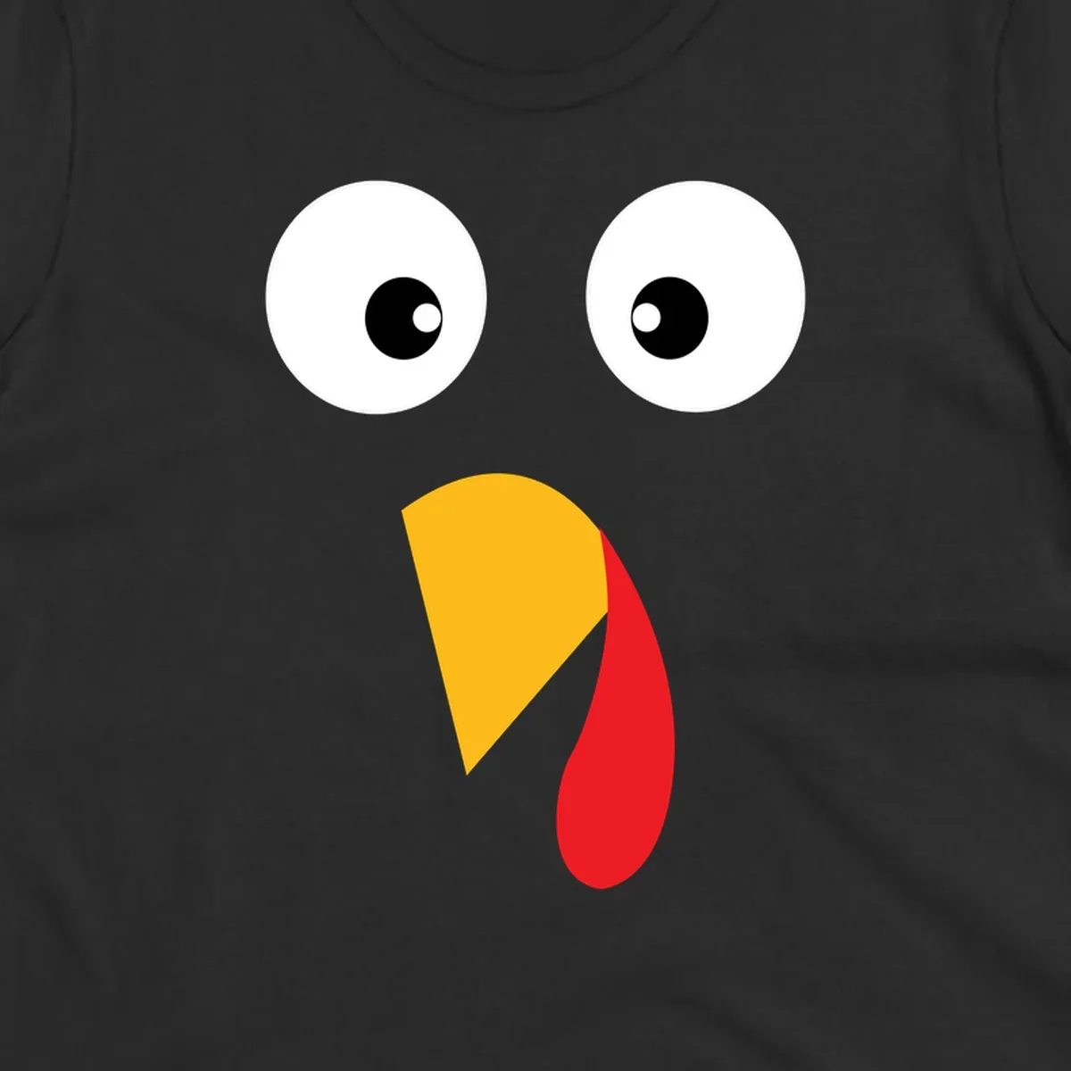 Googly eyed turkey face illustration with yellow beak and red wattle on black background.