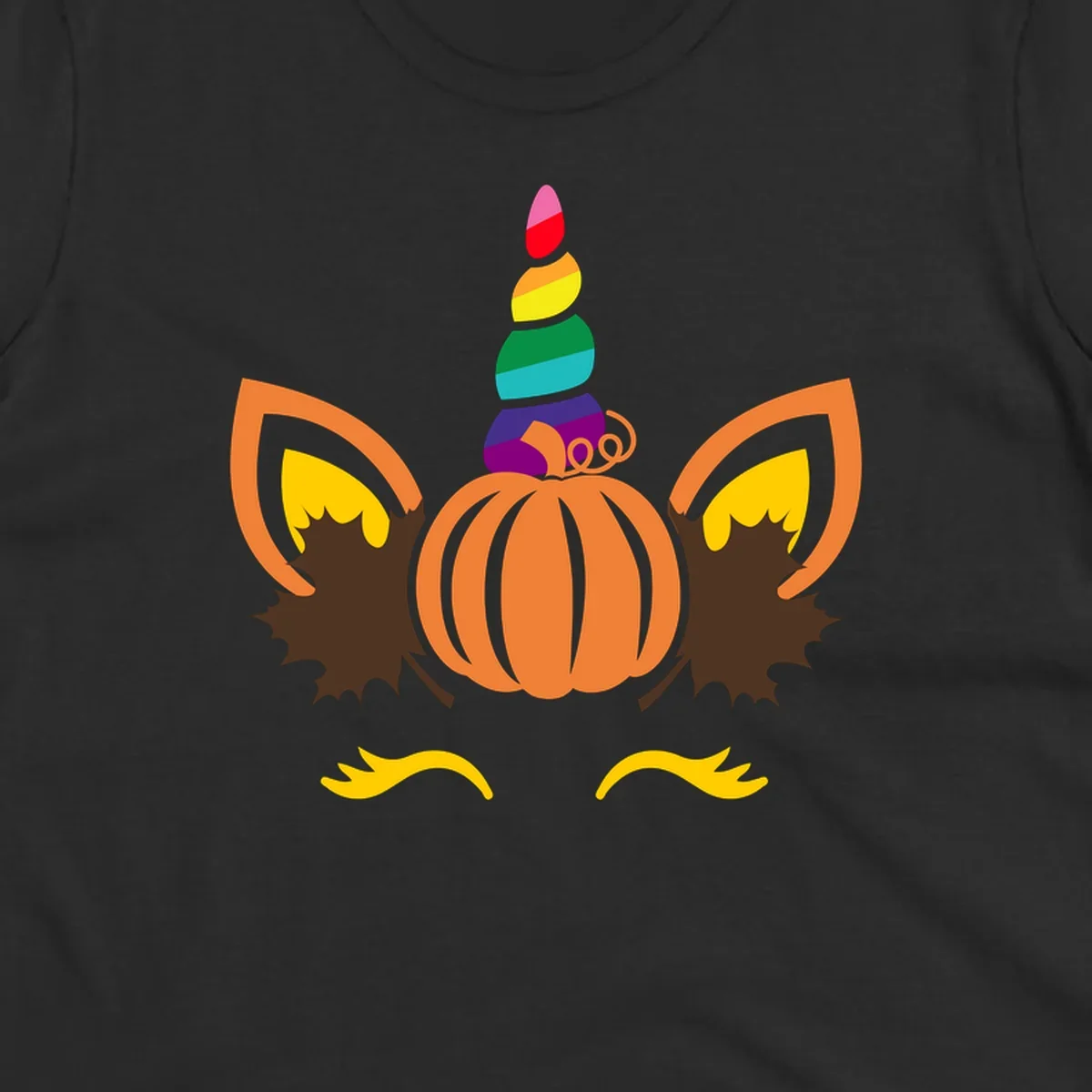 Illustration of a unicorn face made from a pumpkin with a rainbow horn and autumn leaves, on a black background.