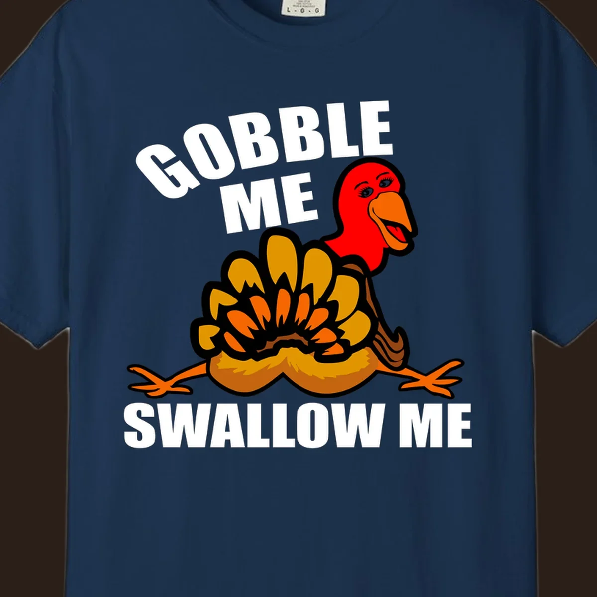 Funny Thanksgiving Gobble Me Swallow Me Turkey design with cartoon turkey and bold text.