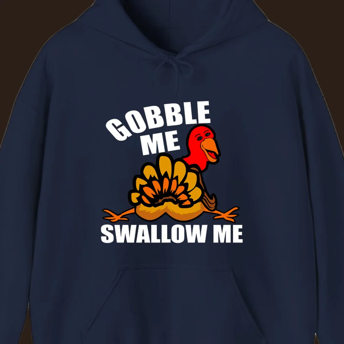 Funny Thanksgiving Gobble Me Swallow Me Turkey design with cartoon turkey and bold text.