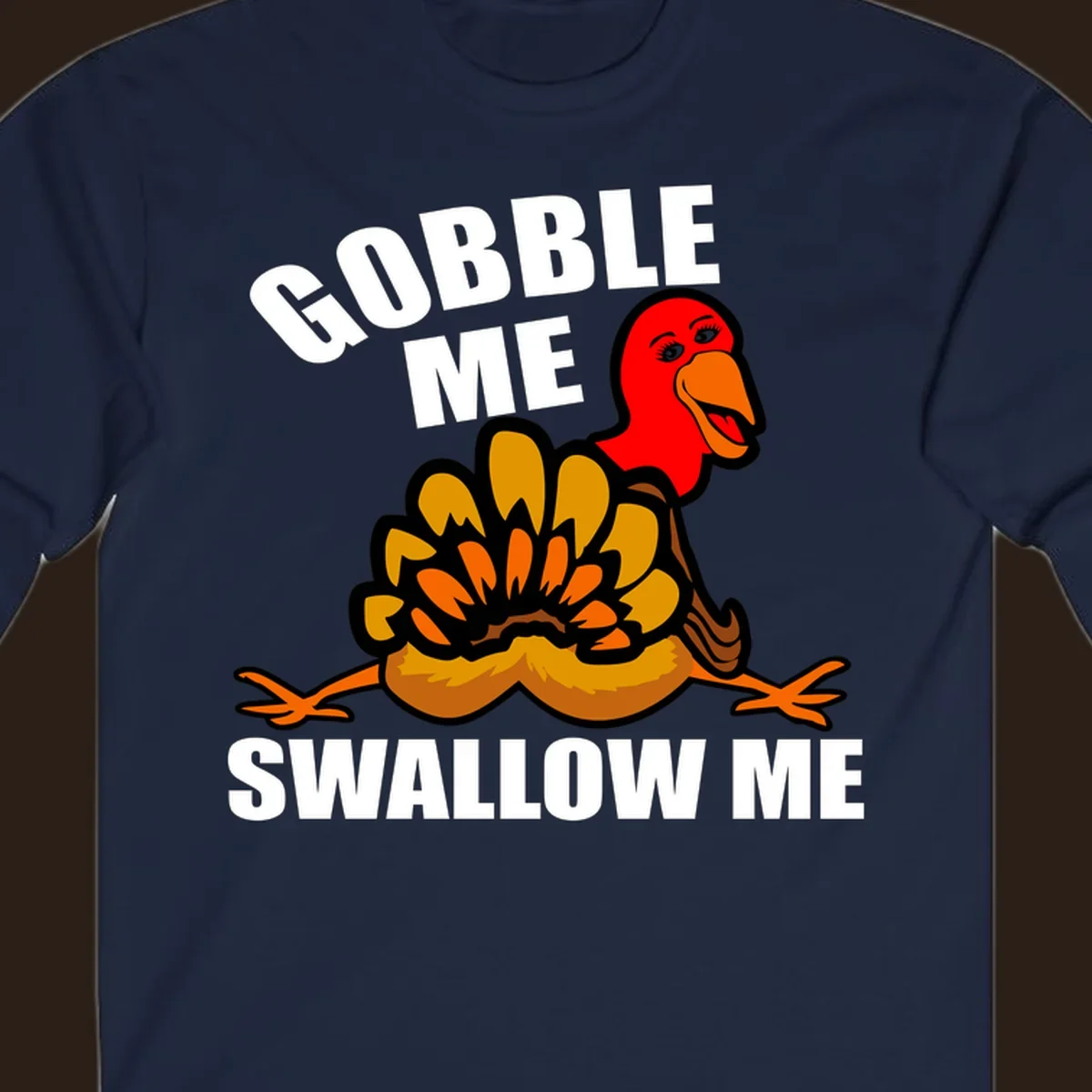 Funny Thanksgiving Gobble Me Swallow Me Turkey design with cartoon turkey and bold text.